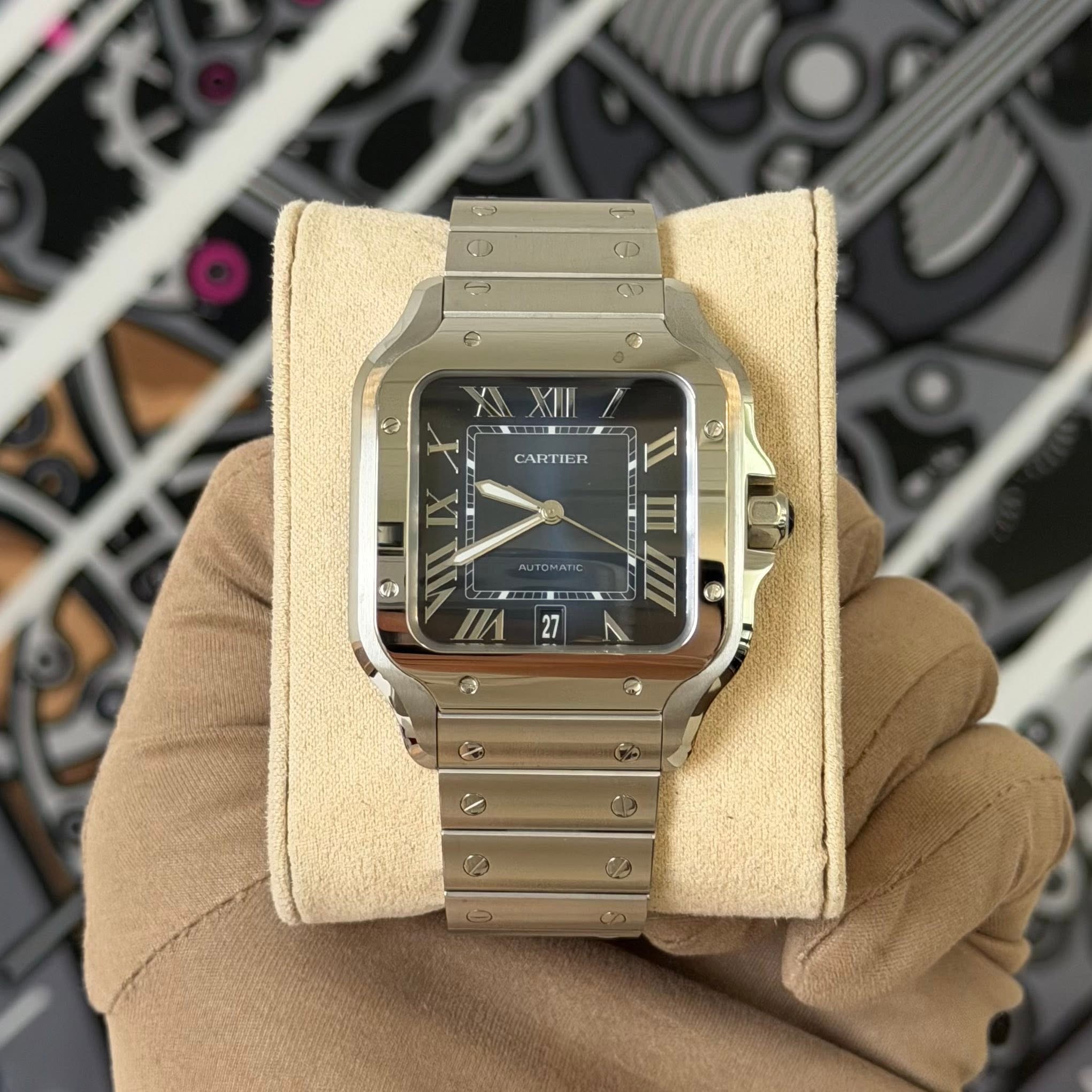 May be an image of digital watch and text that says 'ا S ز a CARTIER ١ 目 の AUTOMATIC @ иИ 27'