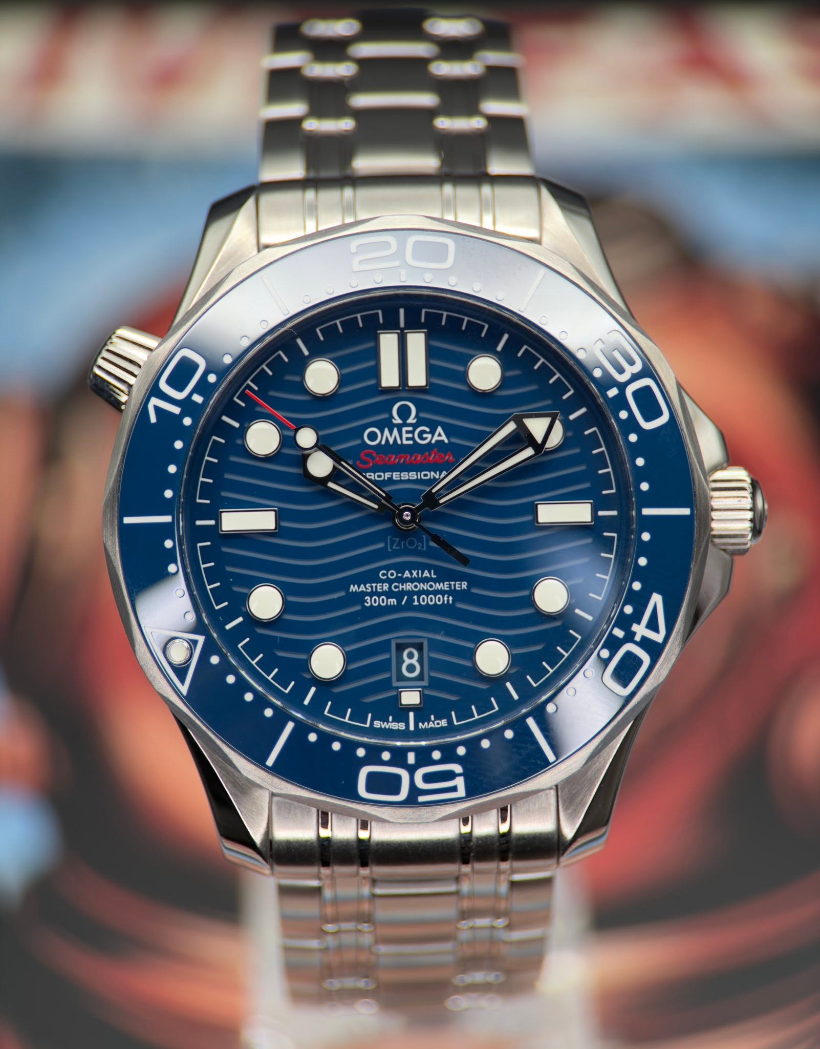 May be an image of wrist watch and text that says '20 10 Ⅱ ח OMEGA B0 O 3 ROFESSIONA SOFESSIONA ON/ CO- CO-AXIAL MASTE MASTERCHBONOMETER TERC HRONOME TER 300m 1000ft O 8 40 X 4…