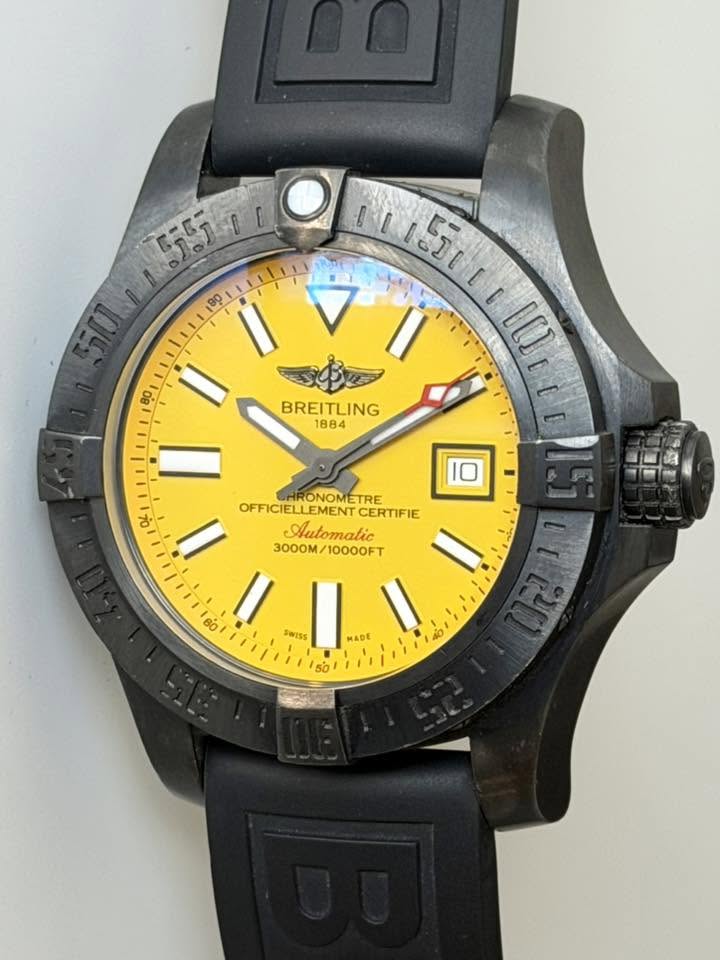 May be an image of digital watch and text that says '155110 II NIEDEL 5วิ0 θp T lUELr I0 10 山口拍 80 I BREITLING 1884 1 HRONOMETRE OFFICIELLEMENT CERTIFIE ١ Automatic 3000M/10000FT…