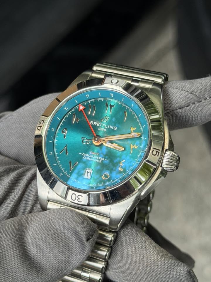May be an image of wrist watch and text
