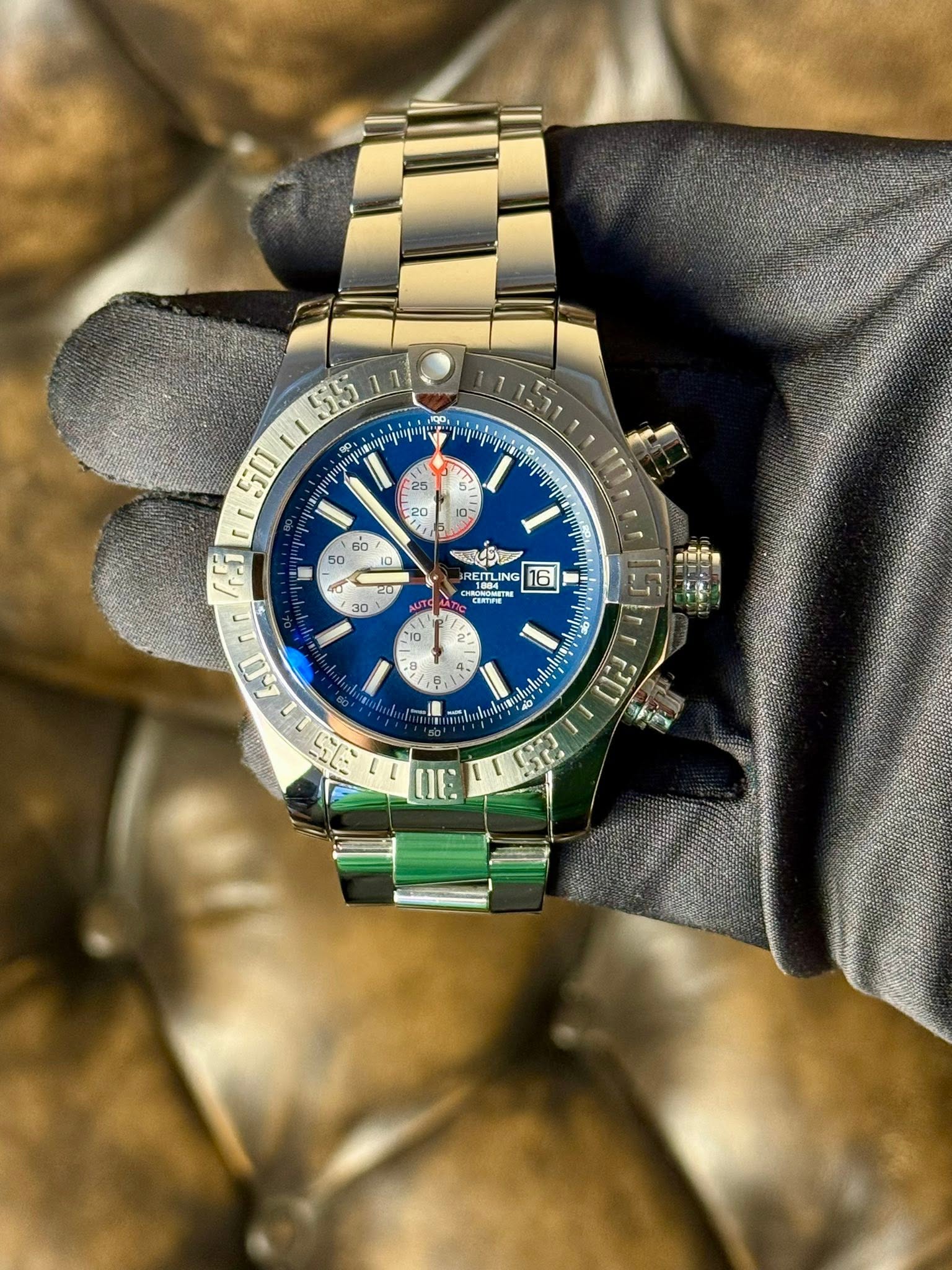 May be an image of wrist watch and text