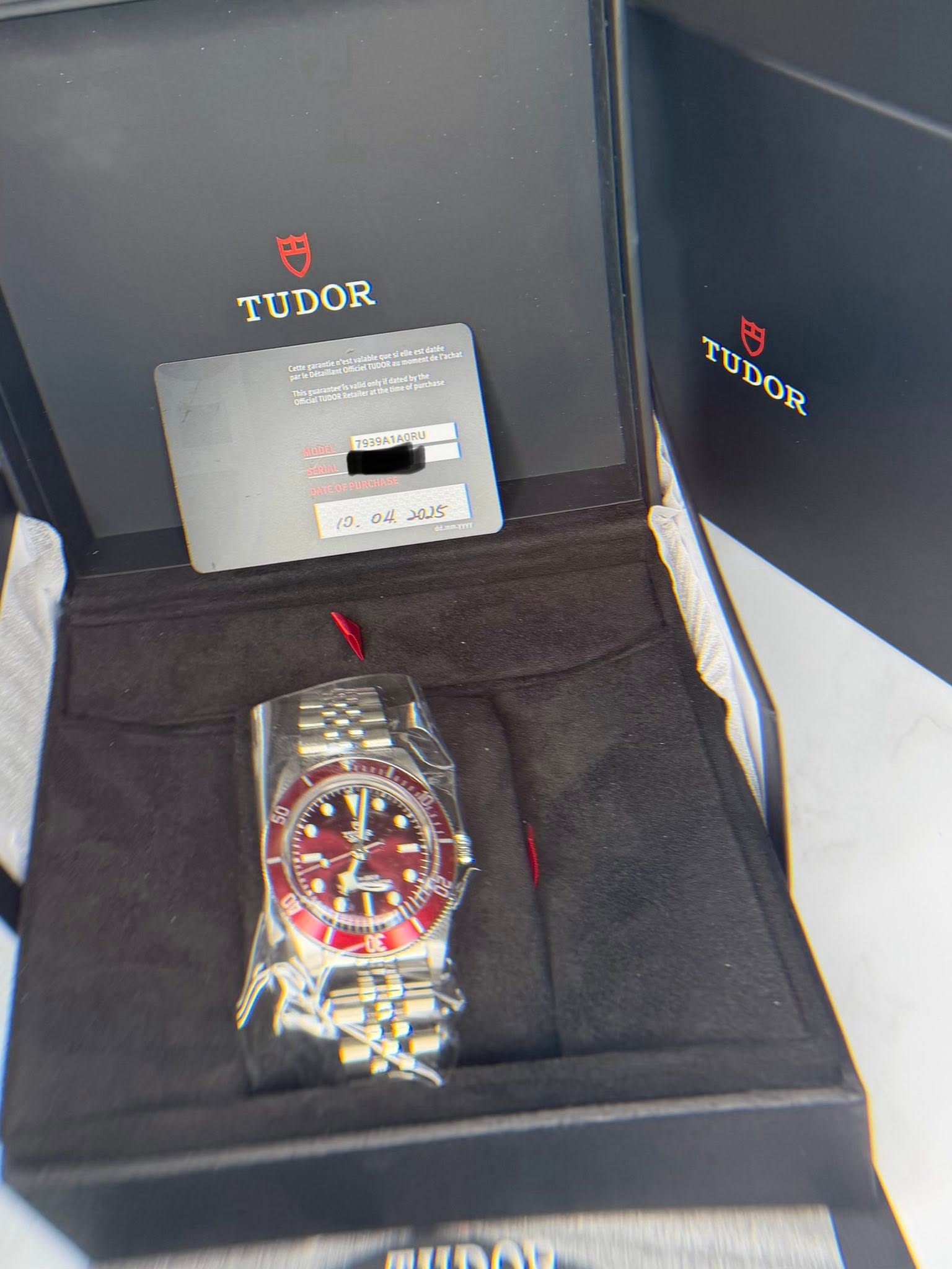 May be an image of wrist watch and text that says 'TUDOR dcan S chenr 7939ATA0RU TUDOR TUDOR (၁. 04 5لمد 50'