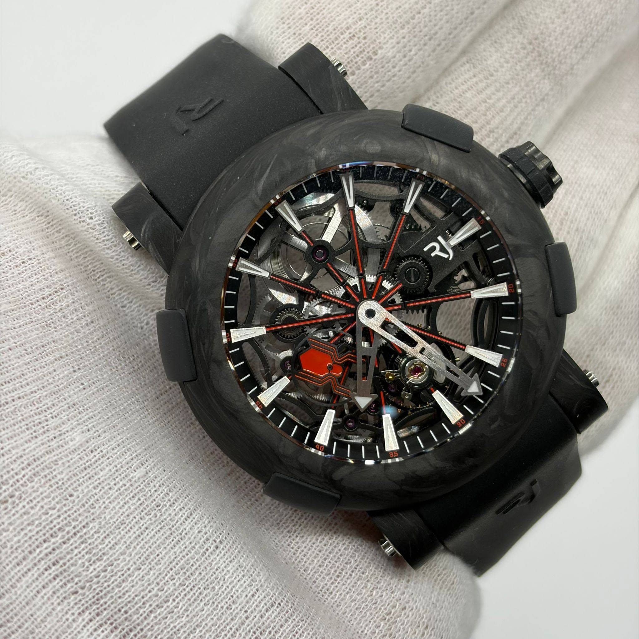 May be an image of wrist watch and text