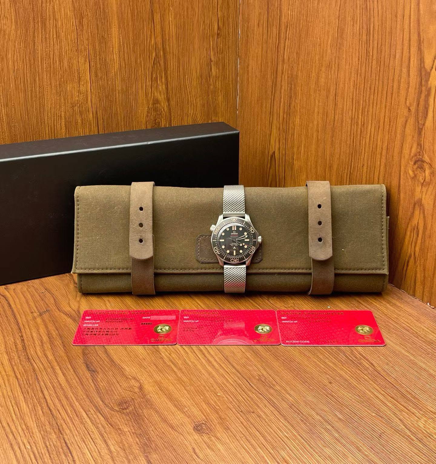May be an image of wrist watch, saddle-stitched leather and text