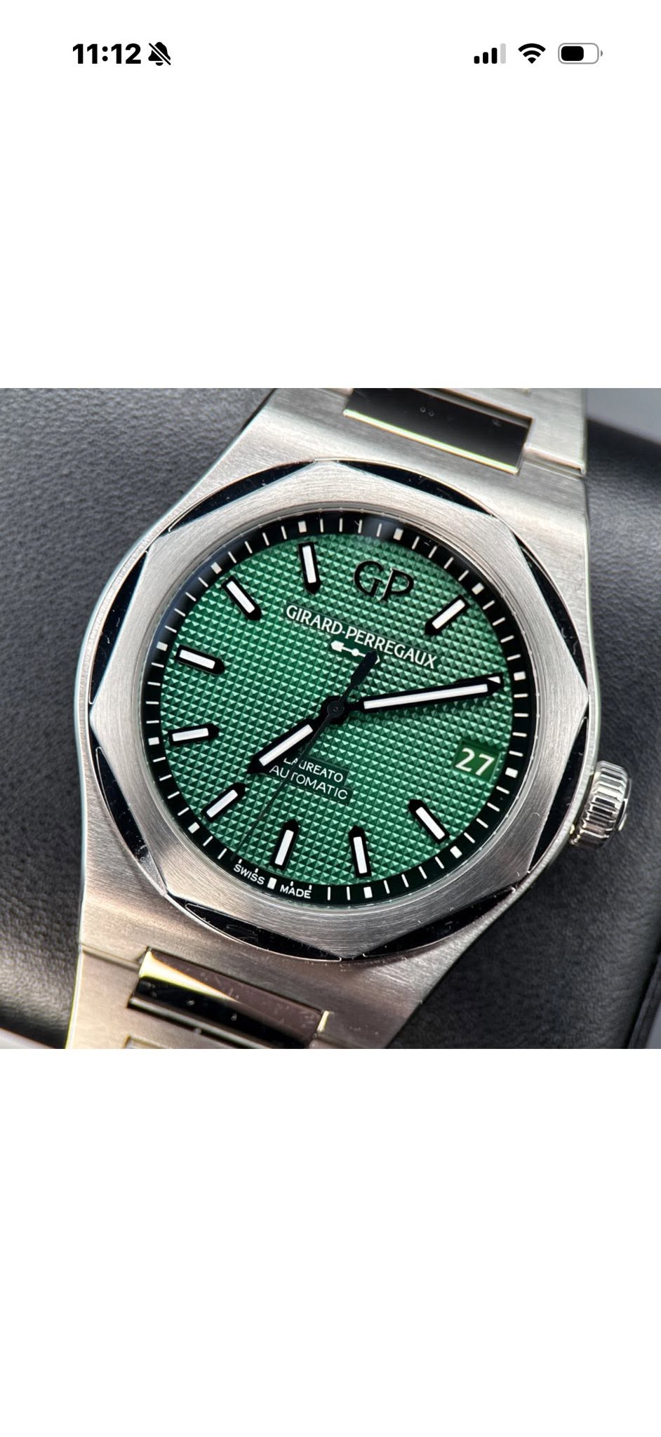 May be an image of wrist watch and text that says '11:12 GIRARD PERRE PERREGAUX EGA GAUX OMATI AT JREATO 27 27 - WIsS I MADE'