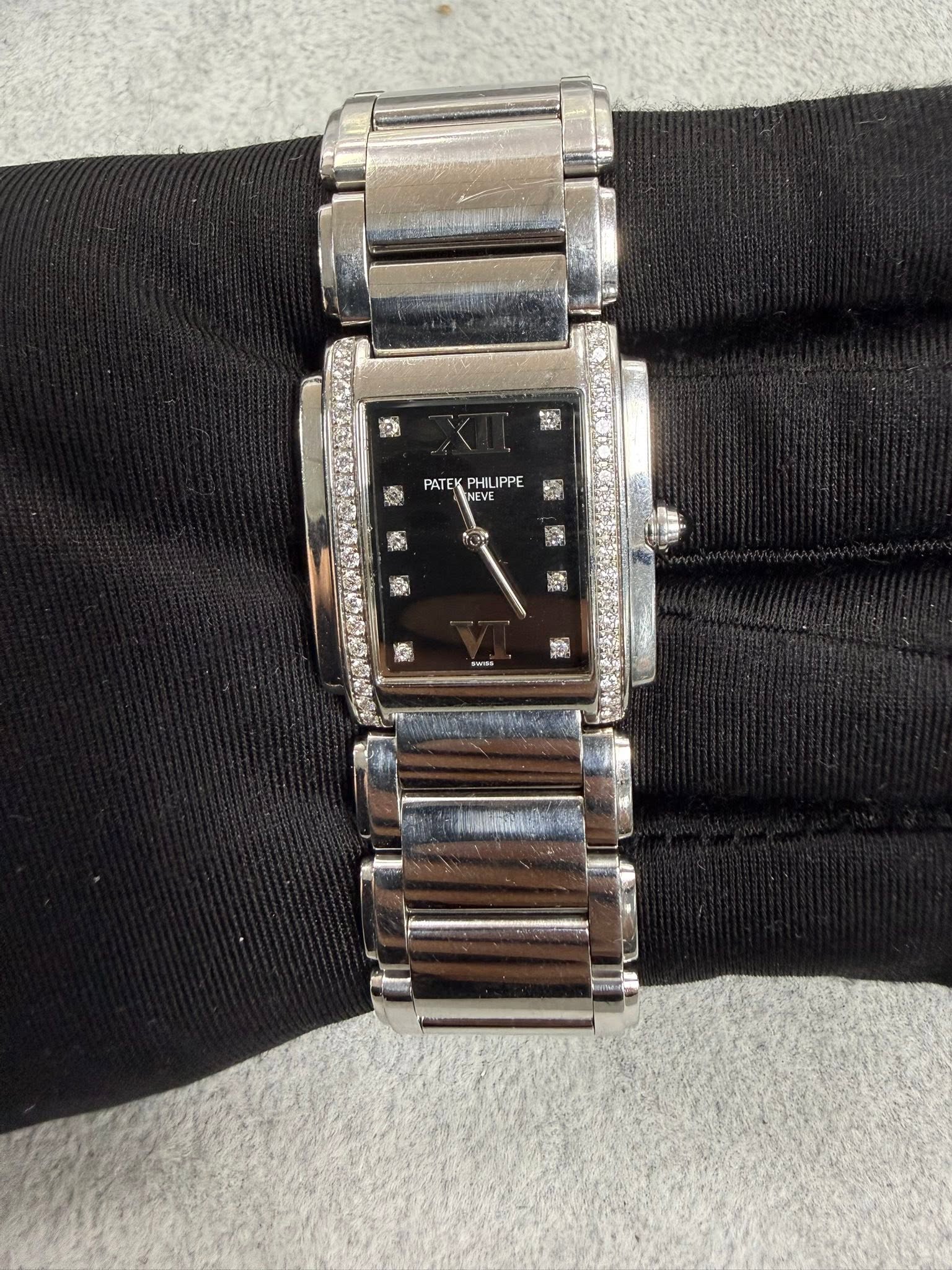 May be an image of wrist watch
