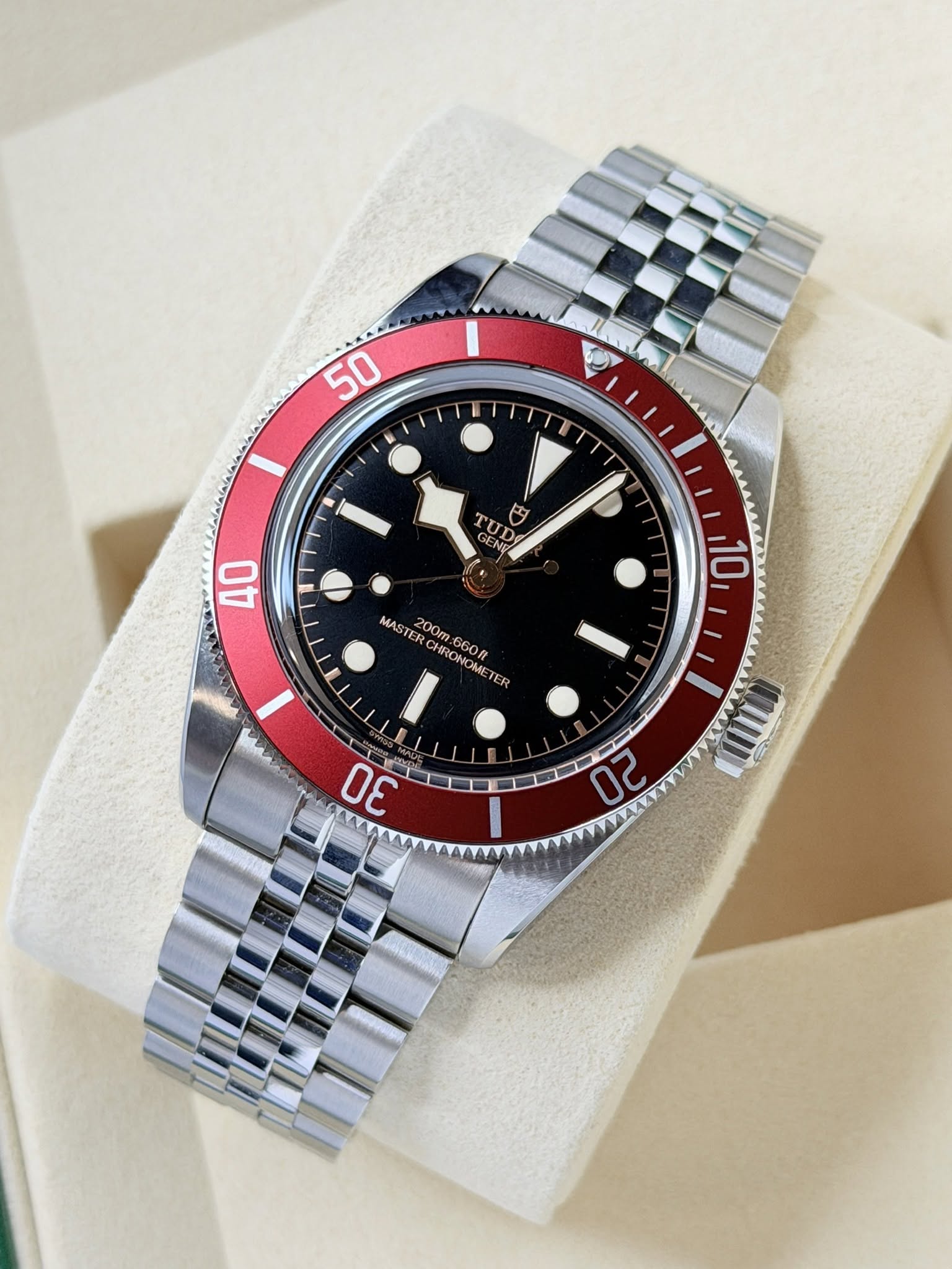 May be an image of wrist watch and text