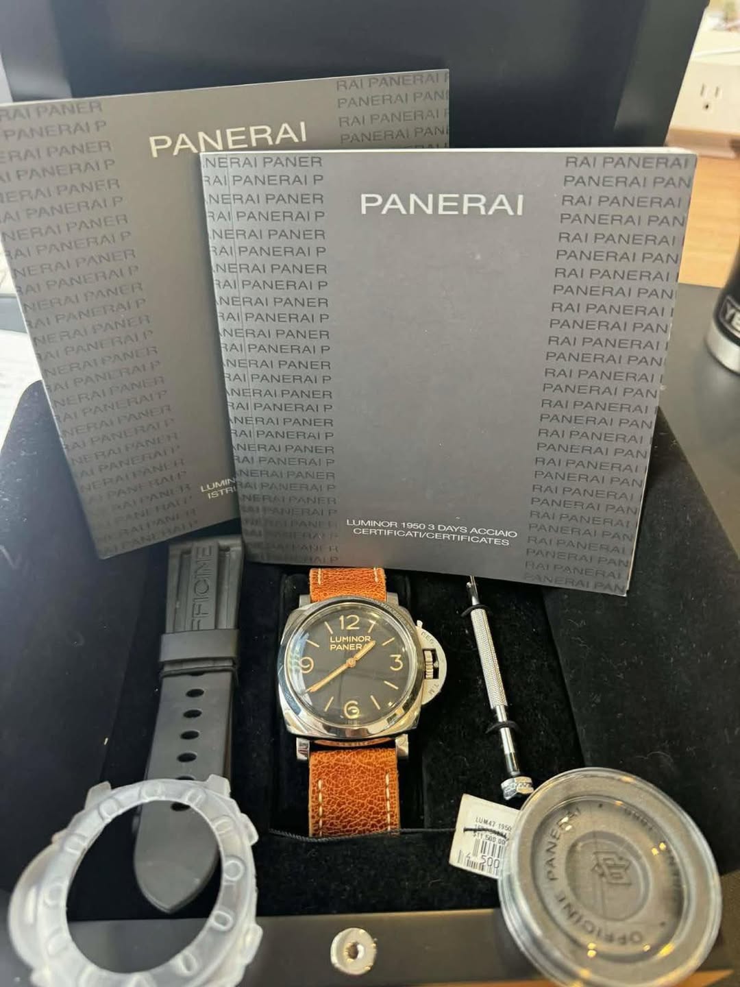 May be an image of wrist watch and text that says 'RALPANERATI PANERAI PANI RALPANERAT PANERATPAI PANERAIP RAI PANER PANERAIP PANER PANERALE ERALPANER NERALPANER PANERALT…