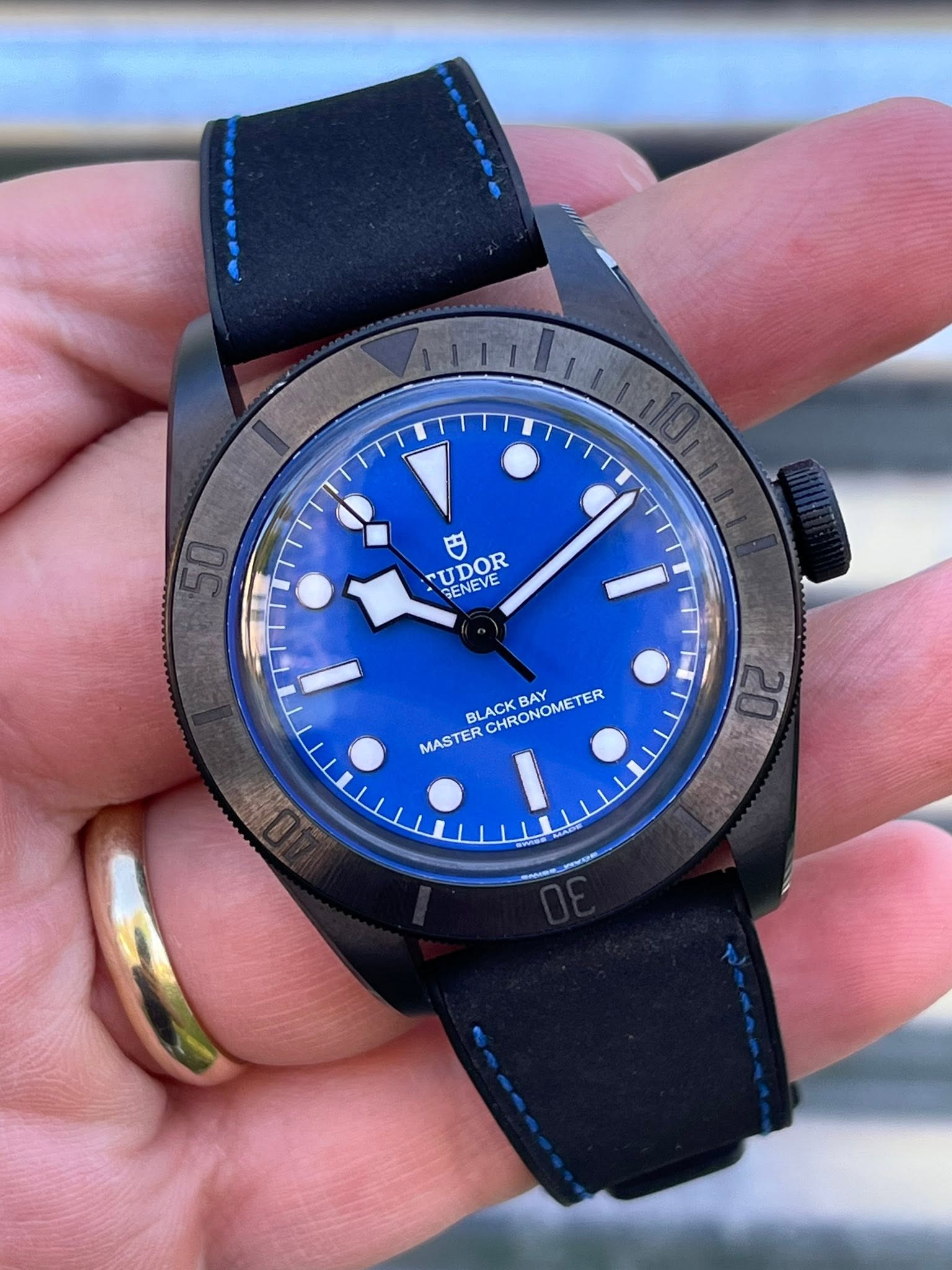 May be an image of wrist watch and text that says '50 円 TUDOR SENEVE 7 BAY MASTER TERCHRONOMETER CHRON HRONOMETER METER 2 20'