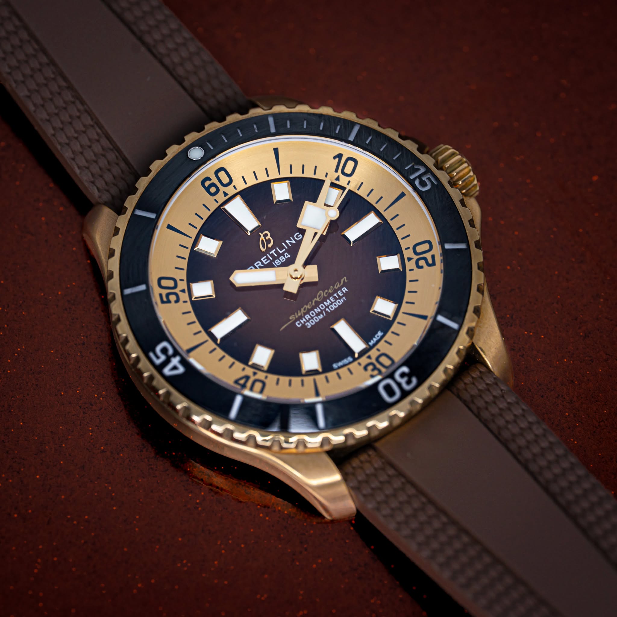 May be an image of wrist watch and text that says ' I 50 22 05 NG RE 1884 ン بل 300M1 300M/1 00u/1000m 1000re AD 6 ල்திම் E 0 σε 94מ, 30 လ ー 45'
