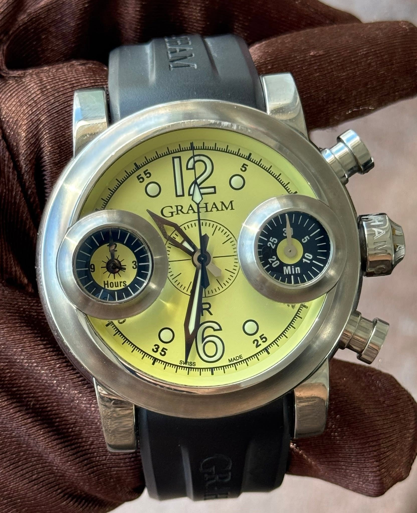 May be an image of wrist watch and text