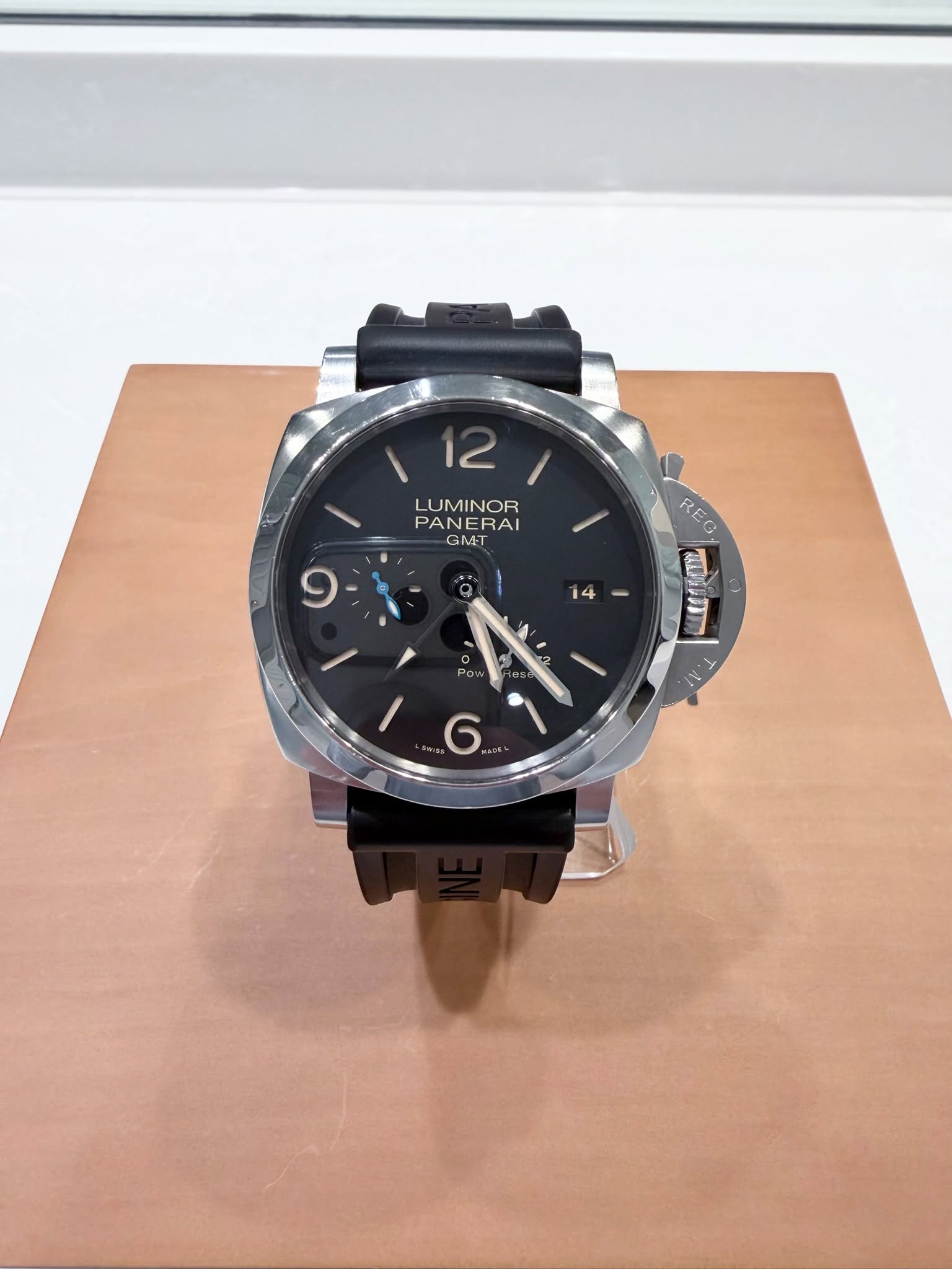May be an image of wrist watch and text