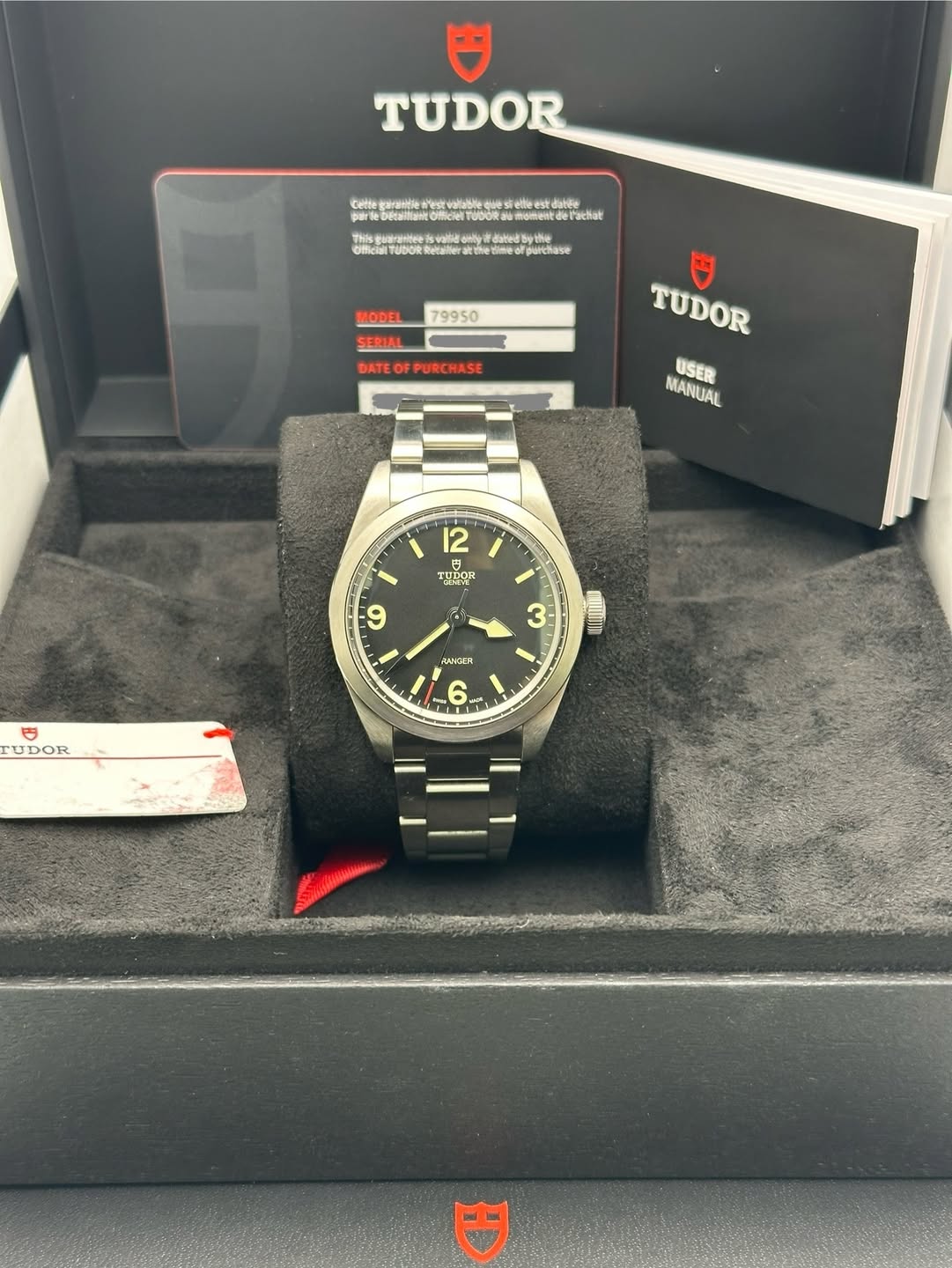 May be an image of wrist watch and text