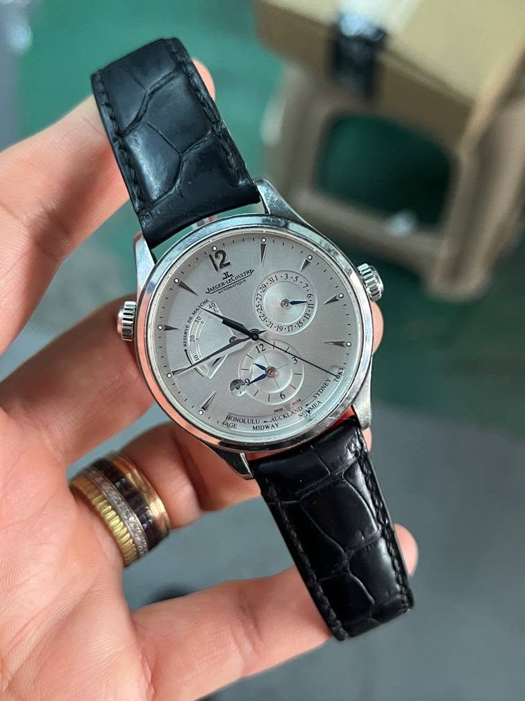 May be an image of wrist watch and text