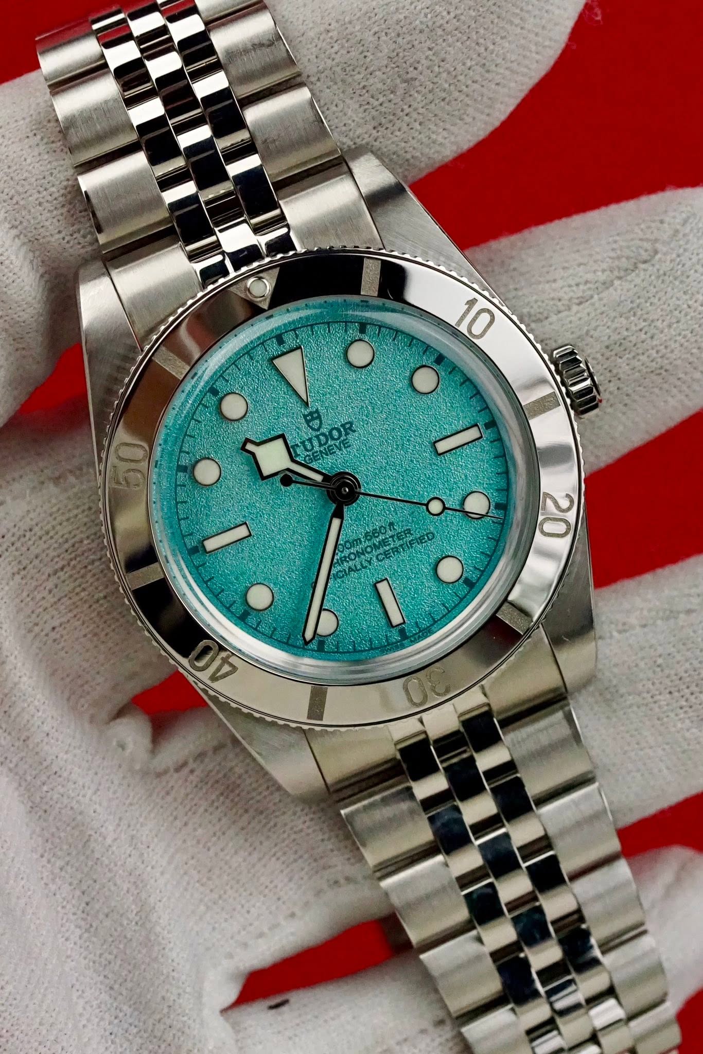 May be an image of wrist watch and text that says '10 LUDOR GEN ARONG NATLY RONOMEE ERTIFIED 20 8L1 40 O'