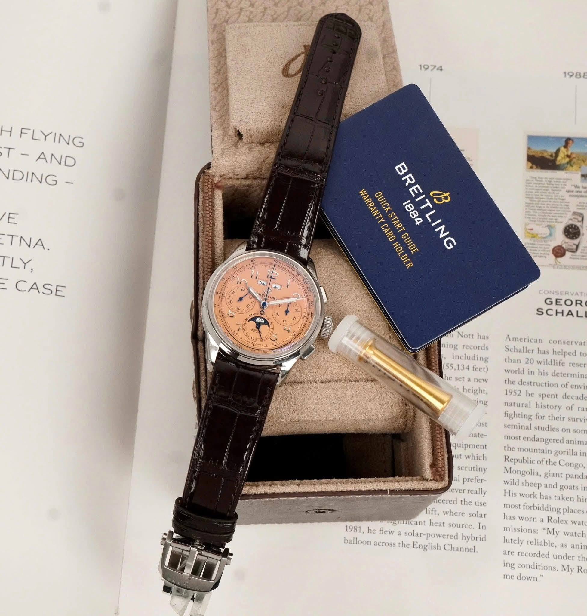 May be an image of wrist watch and text that says '1974 H FLYING T AND NDING 198 E TNA. TLY, CASE BRE WARBANTY QUICKSTART QUICKSTARTGUI CARD QUICKSTARIQUIDE QUIDE 1884 88 ITLING ホC…
