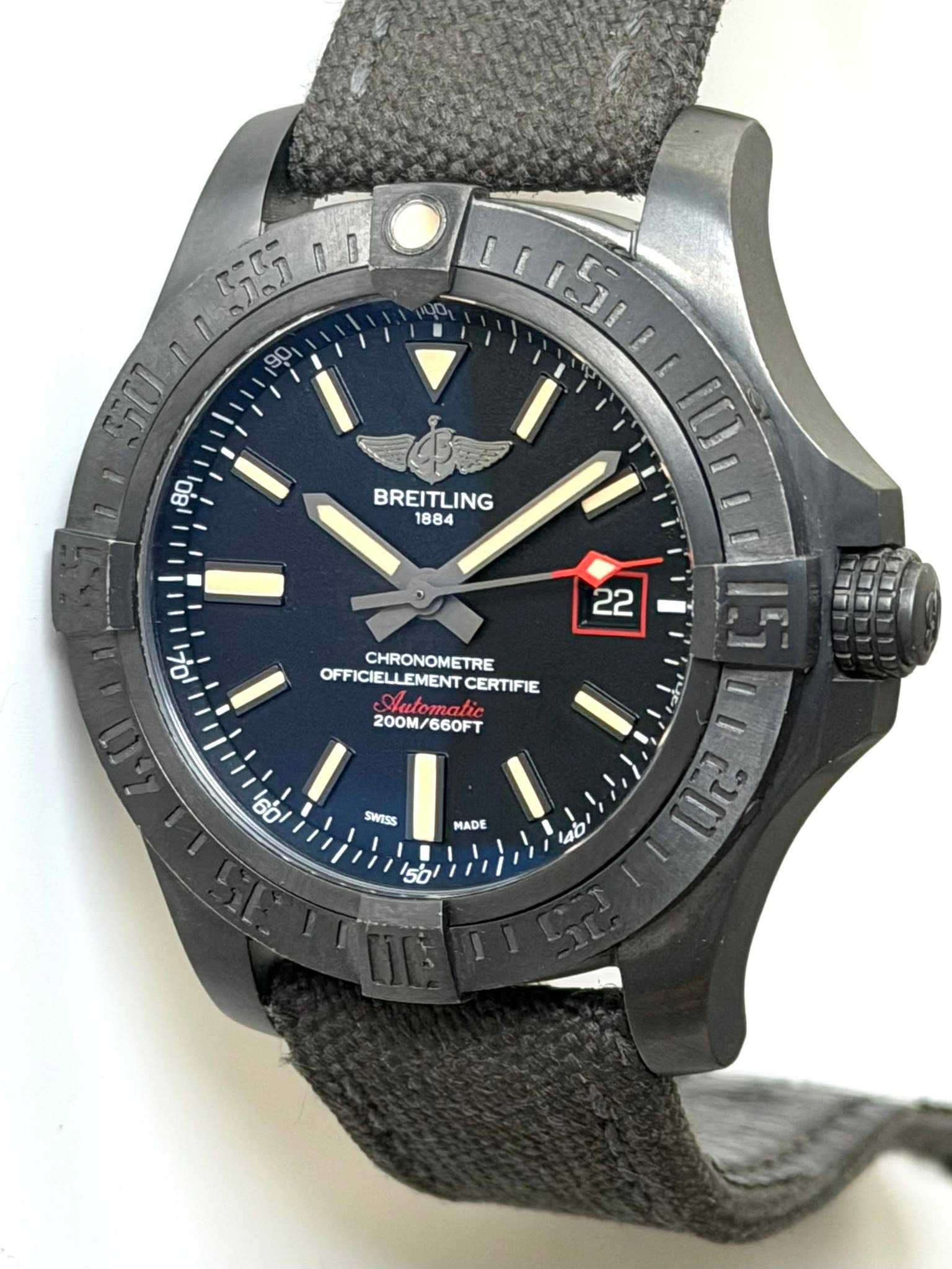 May be an image of digital watch and text that says '55 つクン SUn 90 80 ္သ်္း BREITLING 1884 ١ل/ا 22 CHRONOMETRE OFFICIELLEMENT CERTIFIE זה 2 E ョ 200M/660FT 200M/ ايا SWESS MADE…