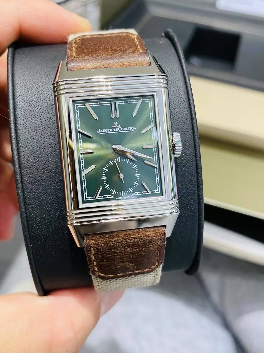 May be an image of wrist watch and text