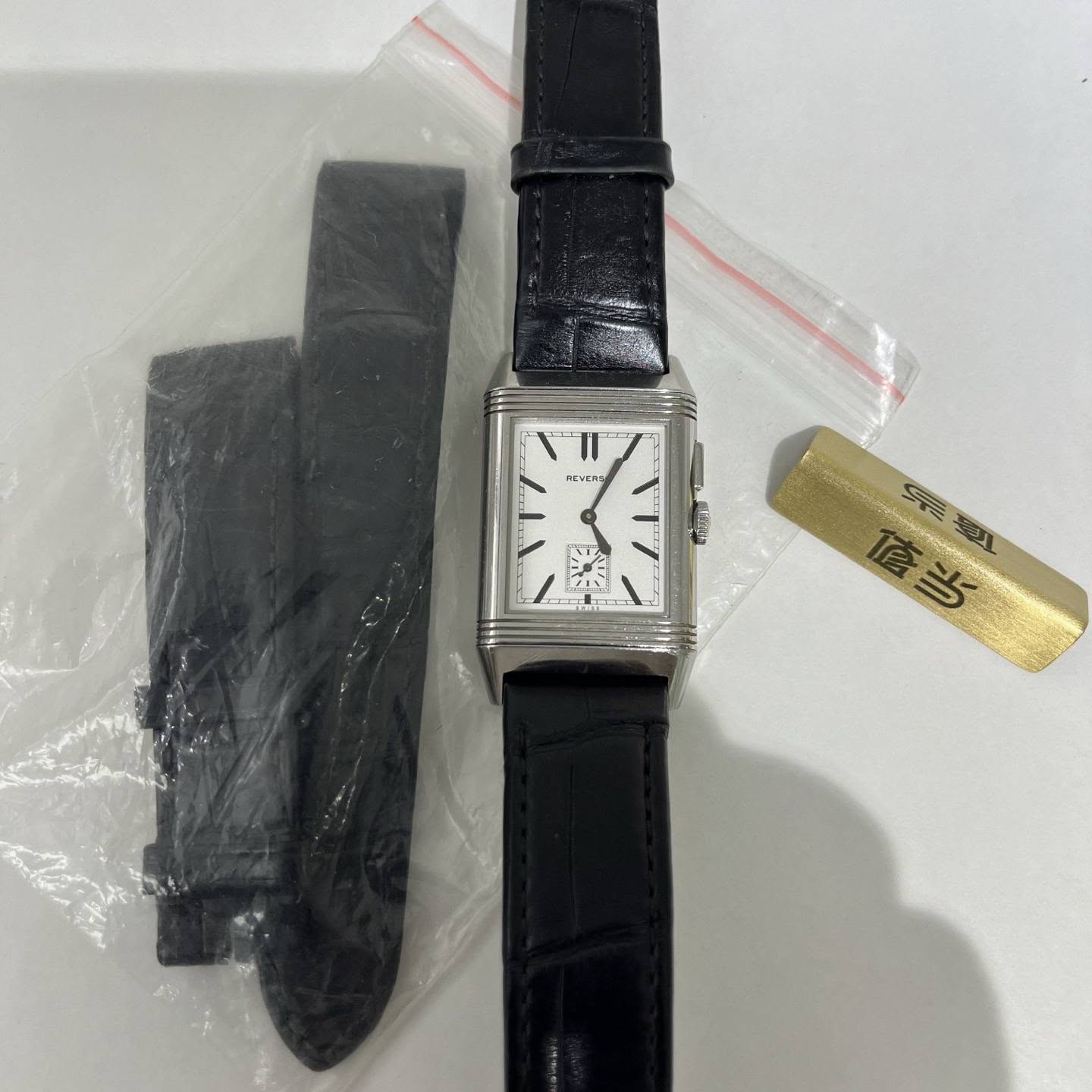 May be an image of digital watch and text