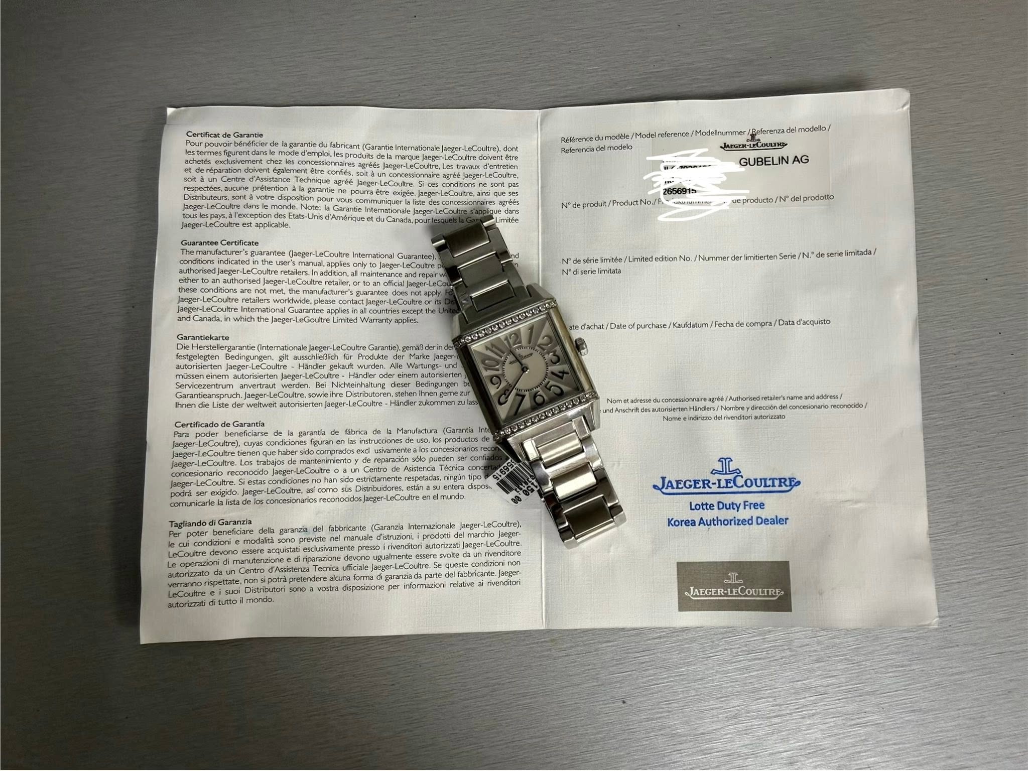 May be an image of wrist watch, ticket stub and text