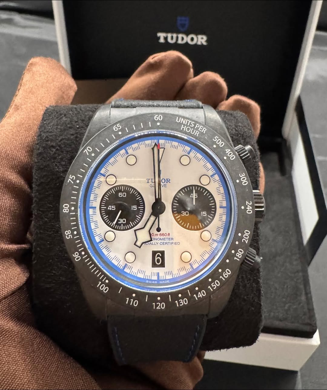 May be an image of wrist watch and text