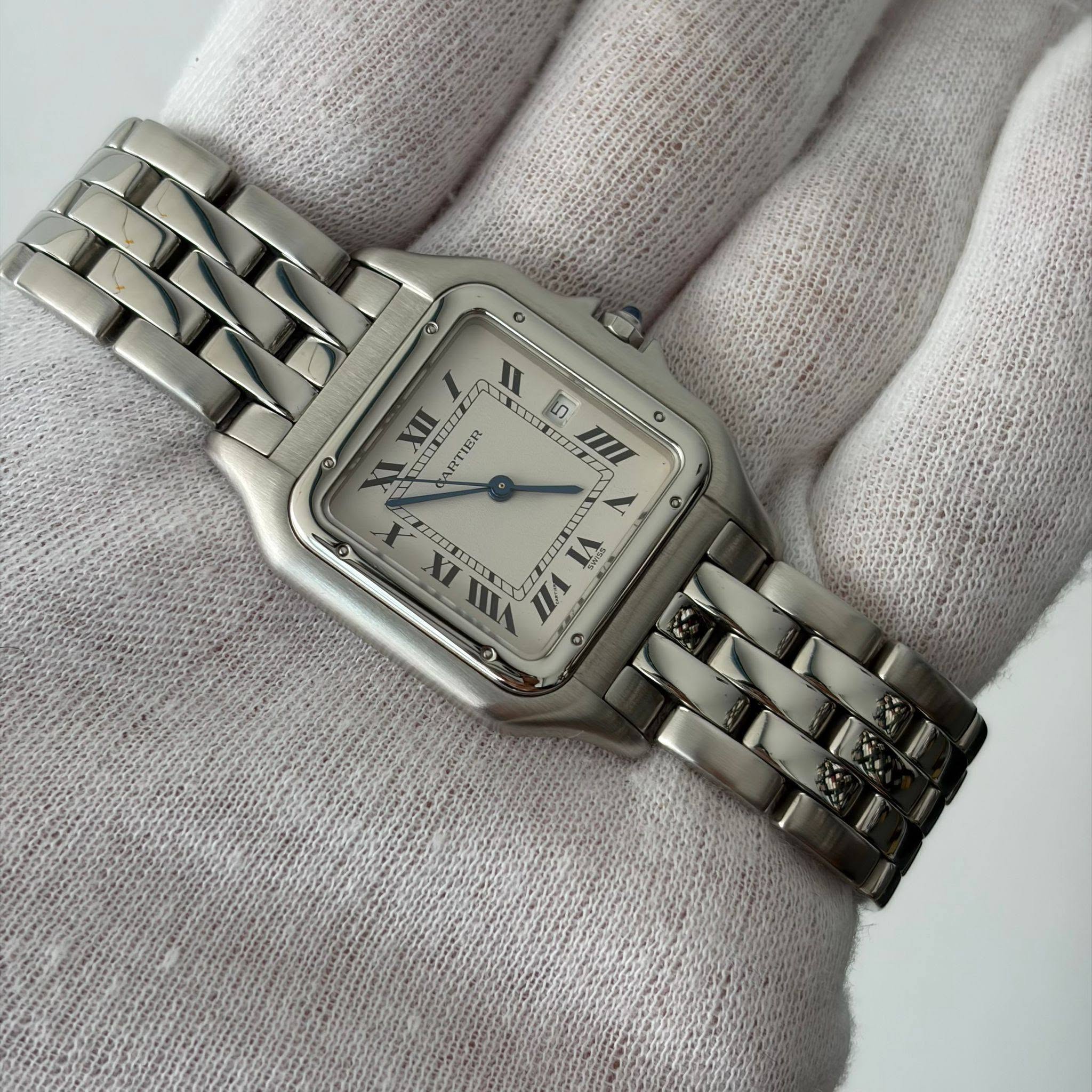 May be an image of wrist watch