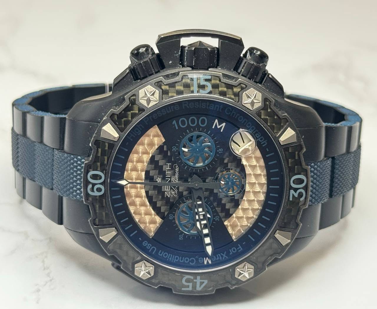 May be an image of wrist watch and text