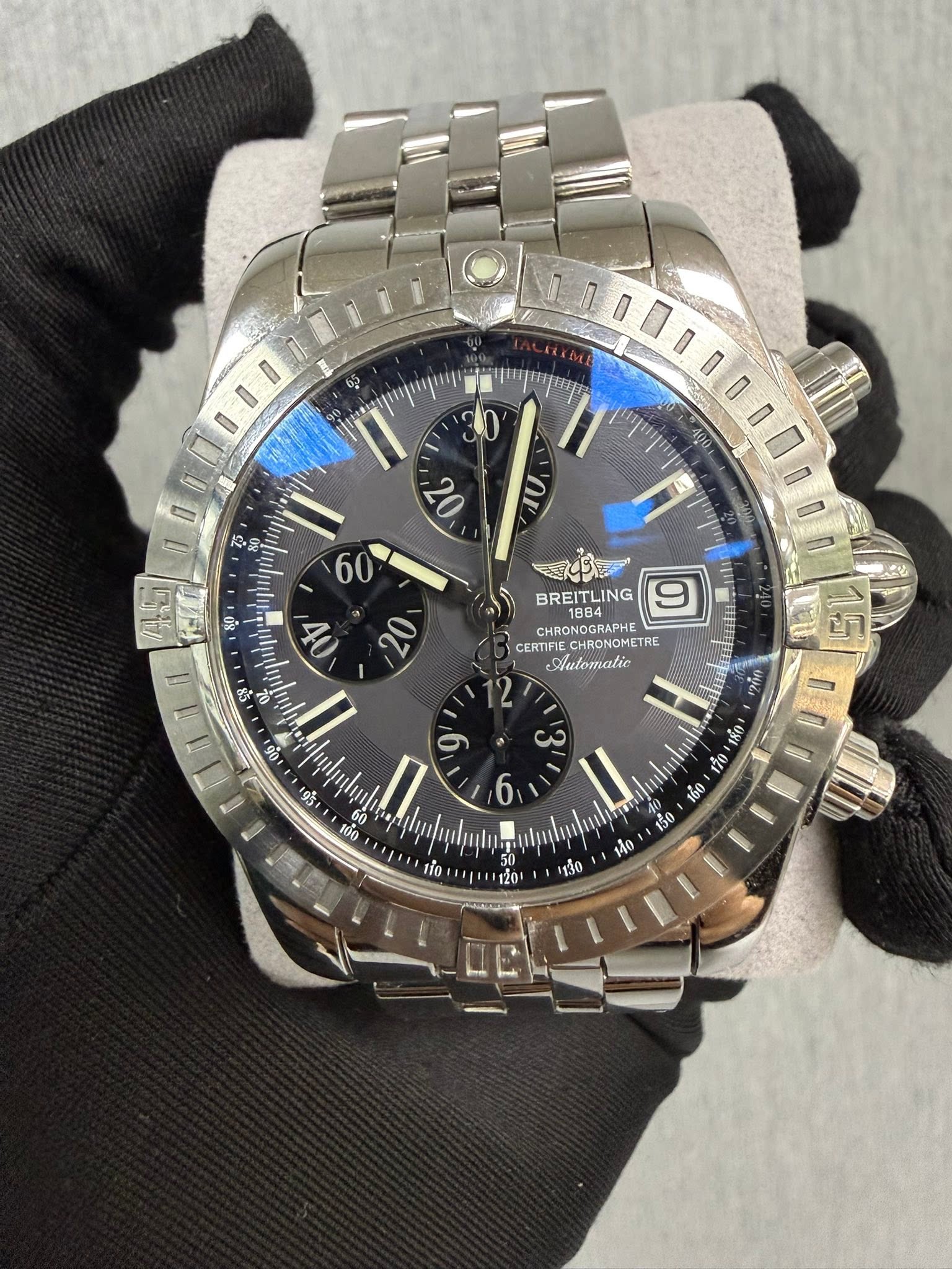 May be an image of wrist watch and text