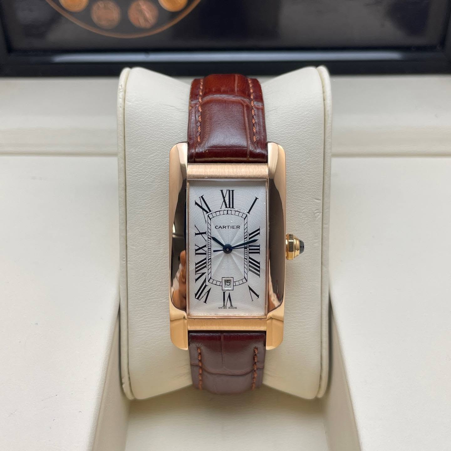 May be an image of wrist watch and text