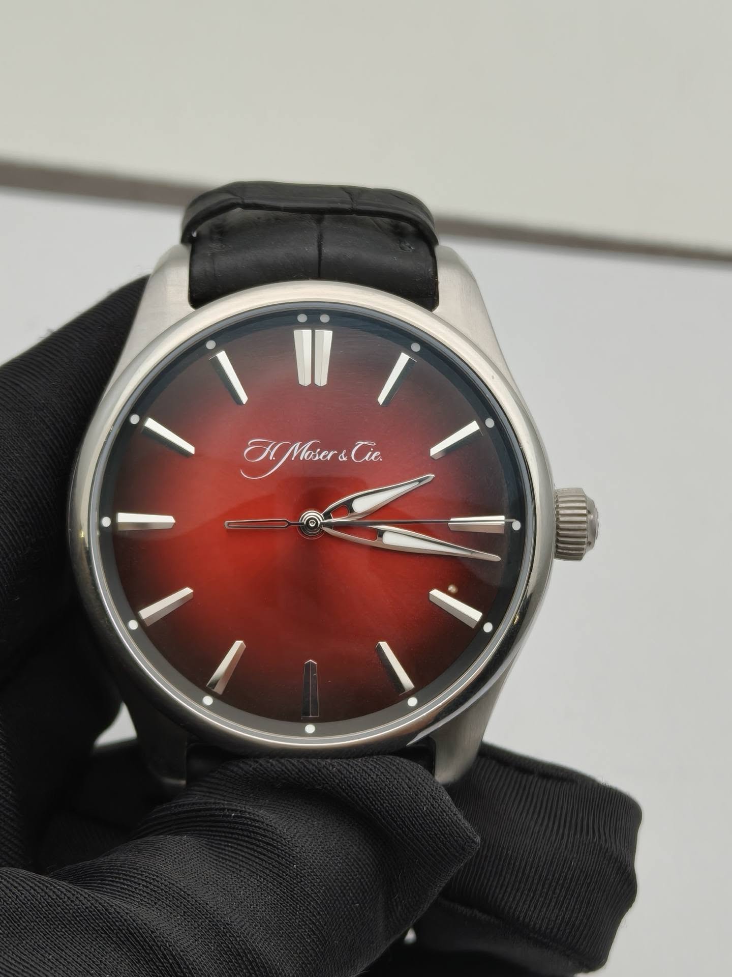 May be an image of wrist watch and text