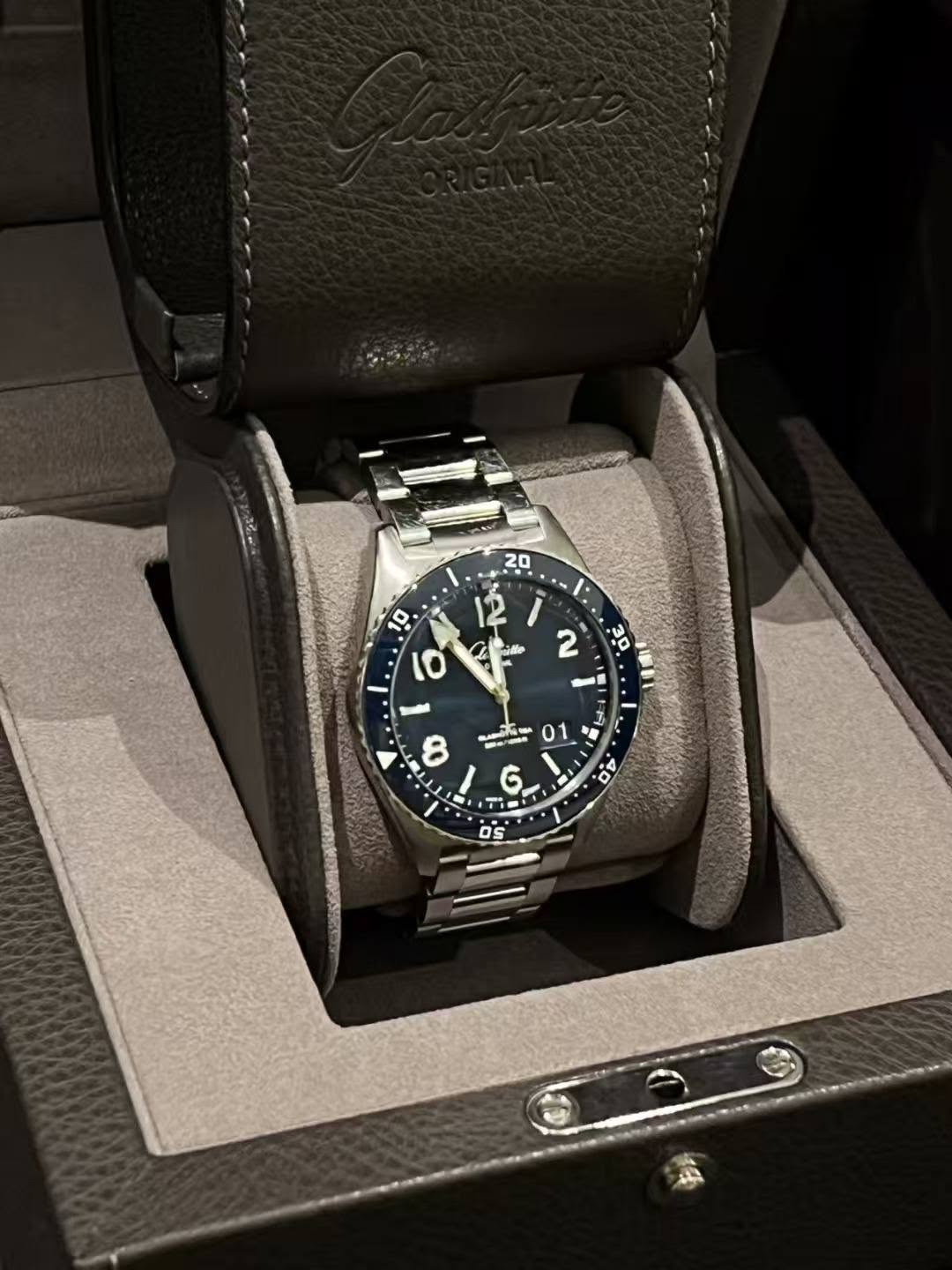 May be an image of wrist watch and text