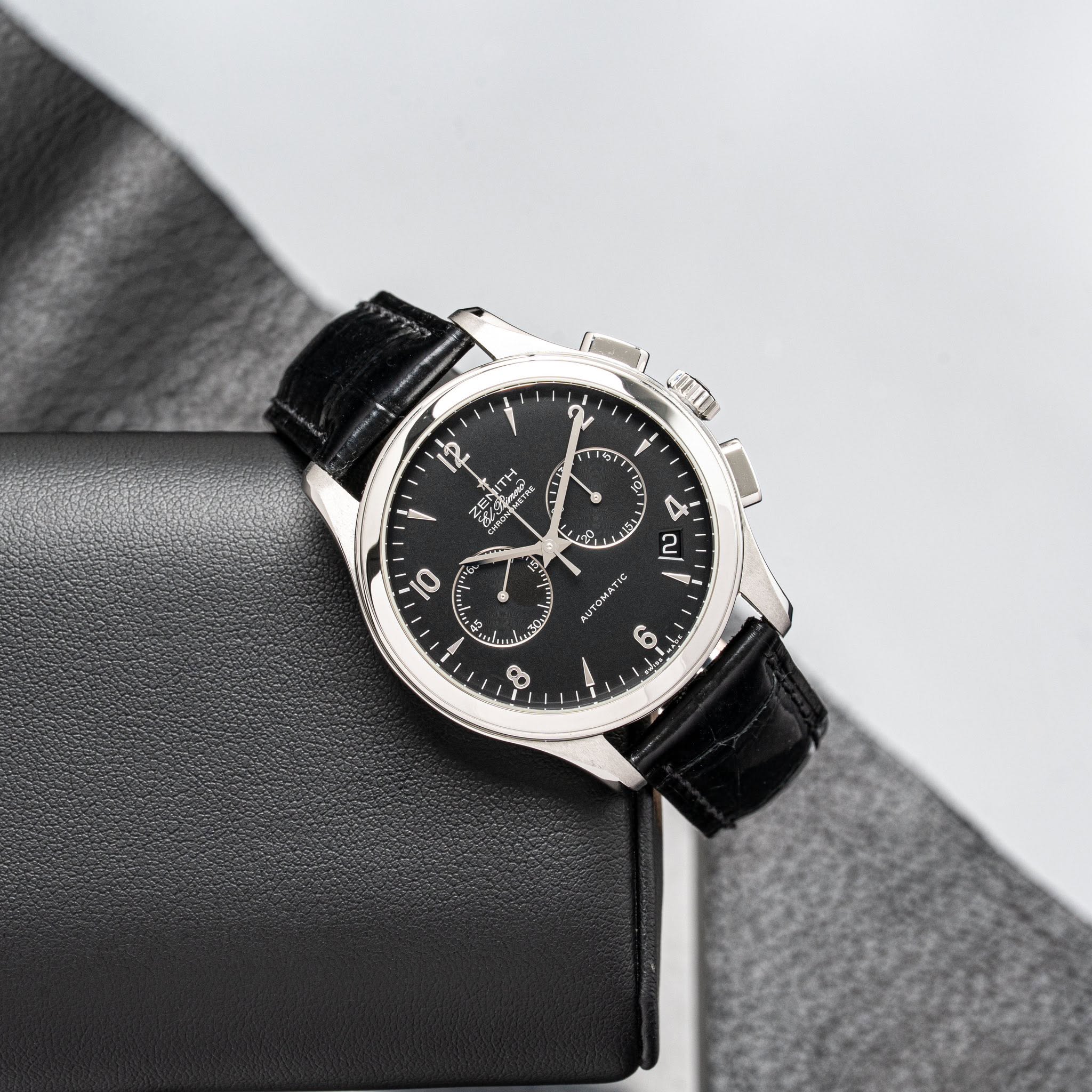 May be an image of leather and wrist watch