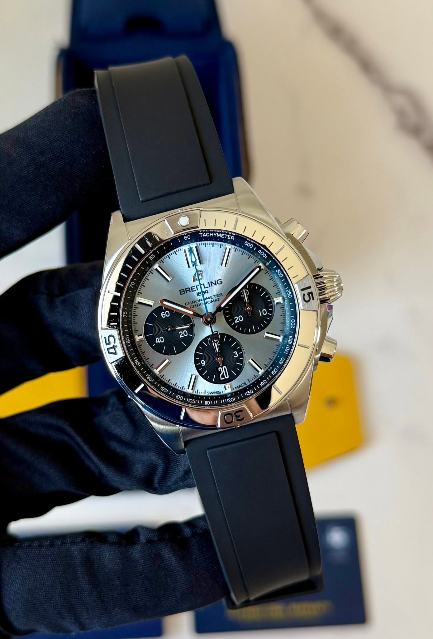 May be an image of wrist watch and text
