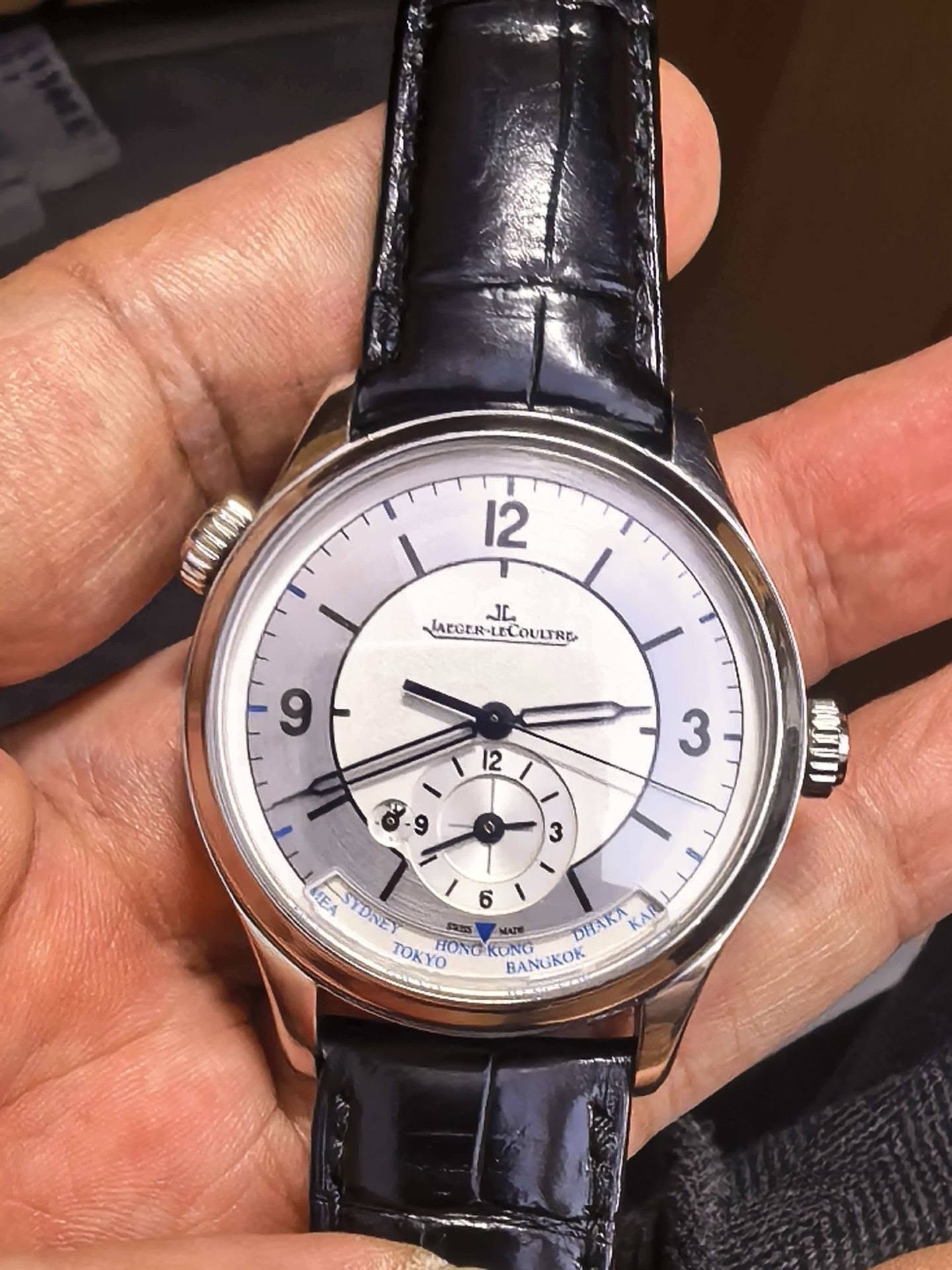 May be an image of wrist watch and text