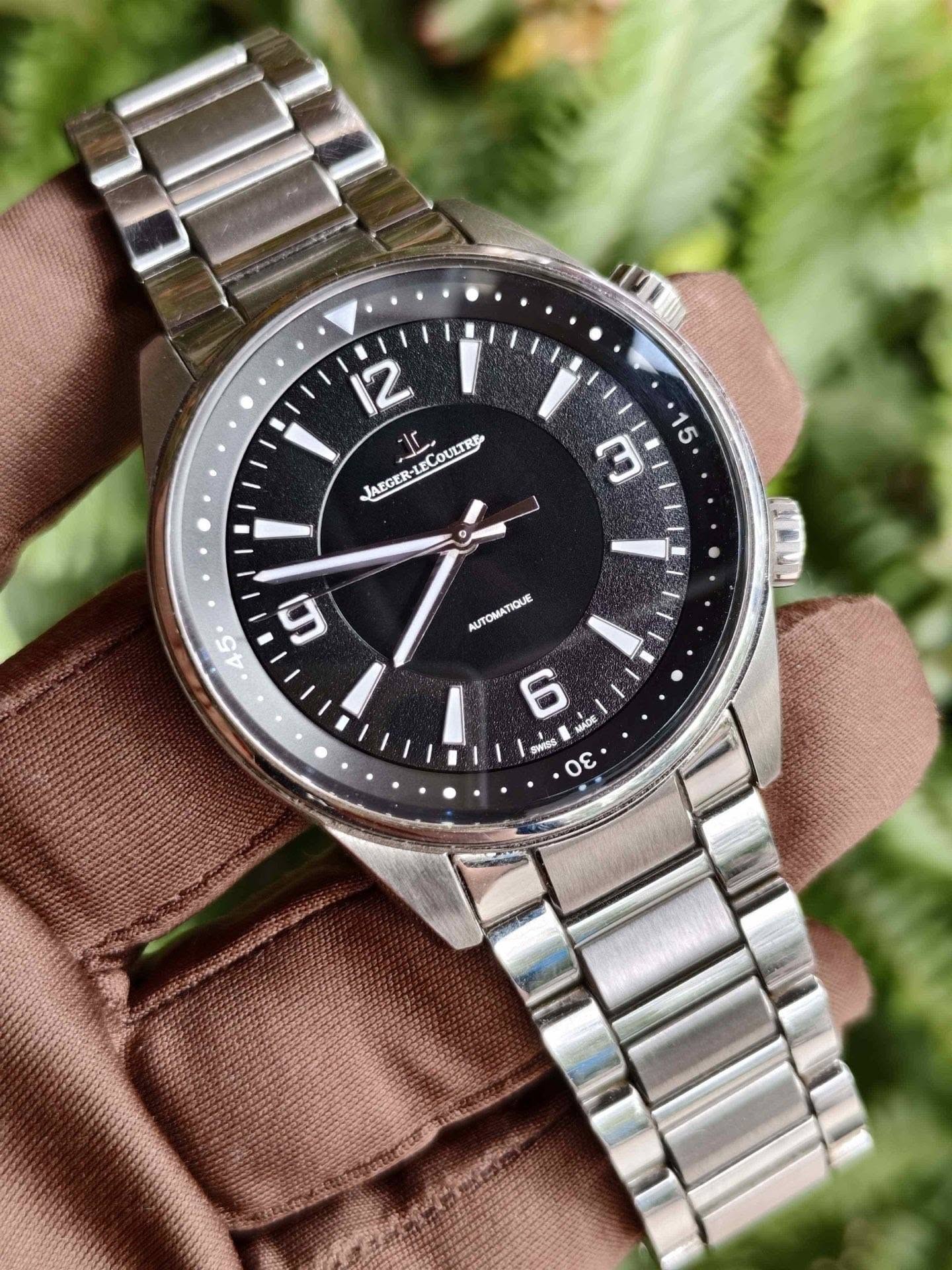 May be an image of digital watch and text that says '12 JAEGER- ECO COULTRE ALGER-IECOULTE Ir M 15 AyTObl AUTOMATIQUE 45 6 MADE SWISS θε ε'