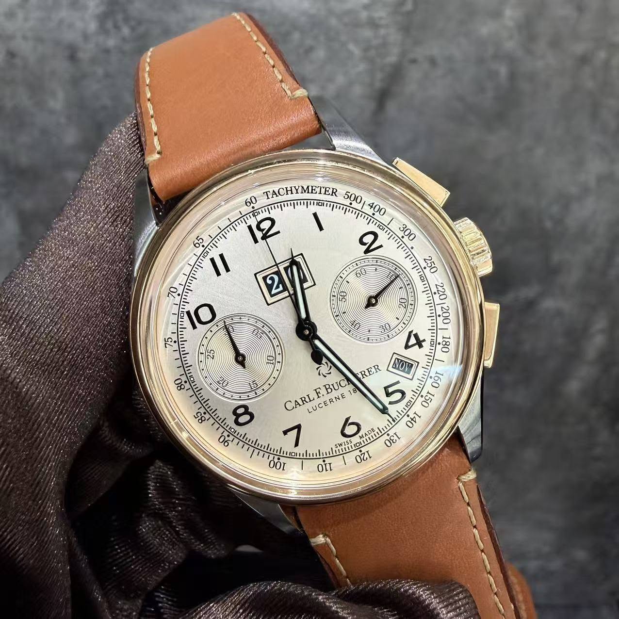 May be an image of wrist watch and text