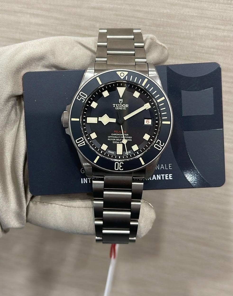 May be an image of wrist watch and text