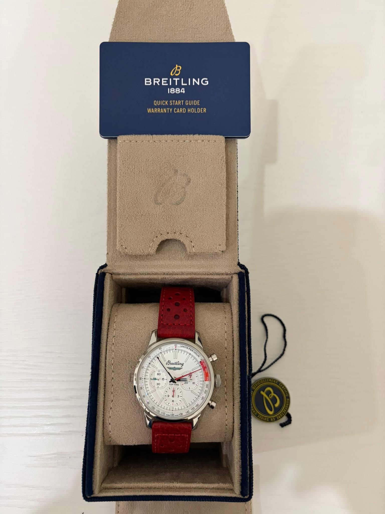 May be an image of wrist watch and text