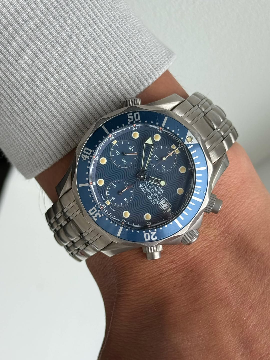 May be an image of wrist watch and text