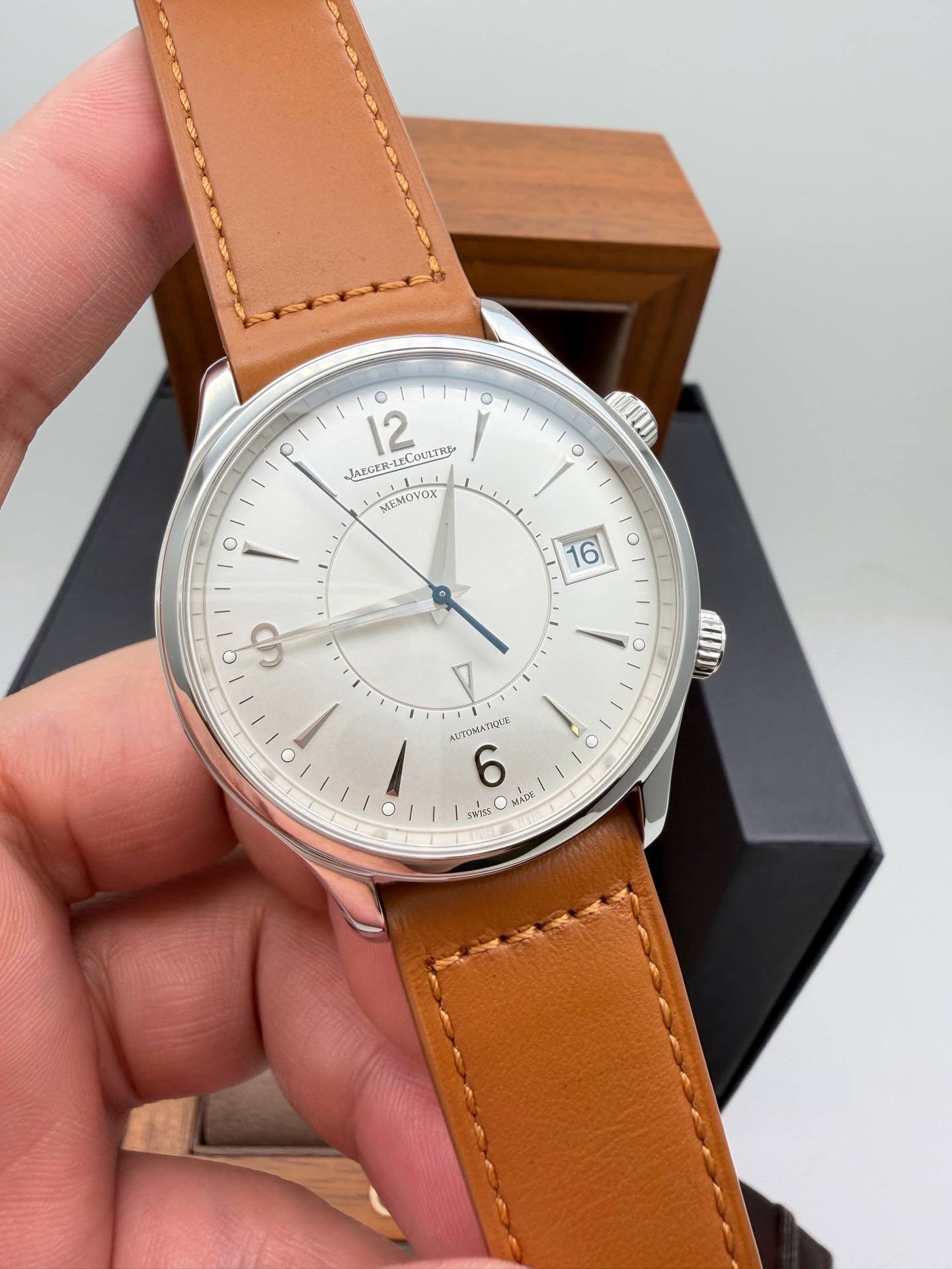 May be an image of wrist watch and text
