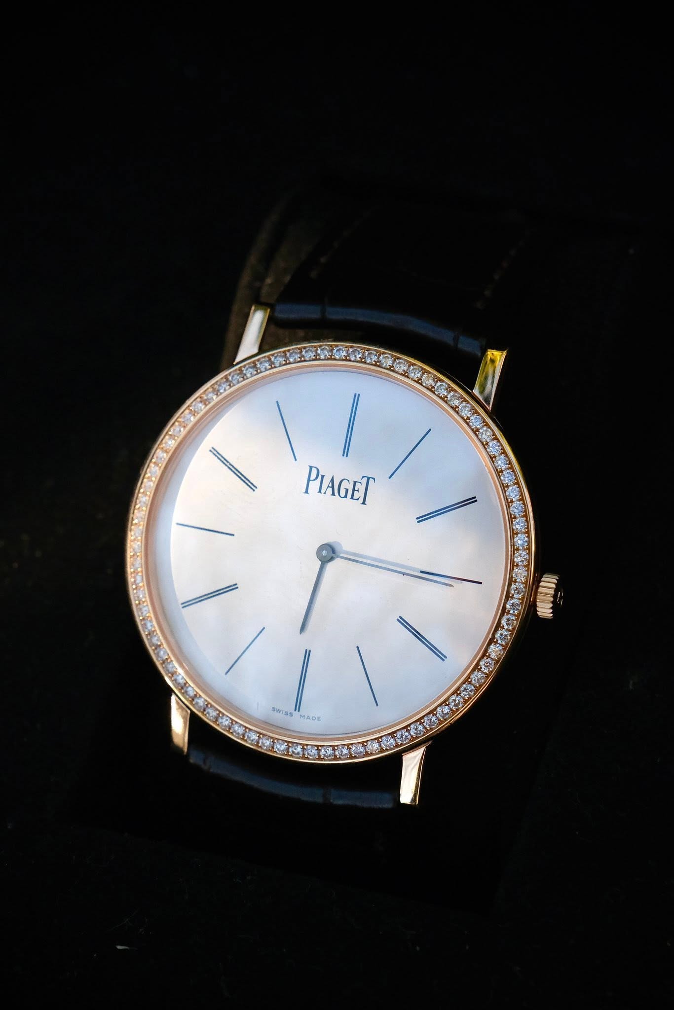 May be an image of wrist watch and text