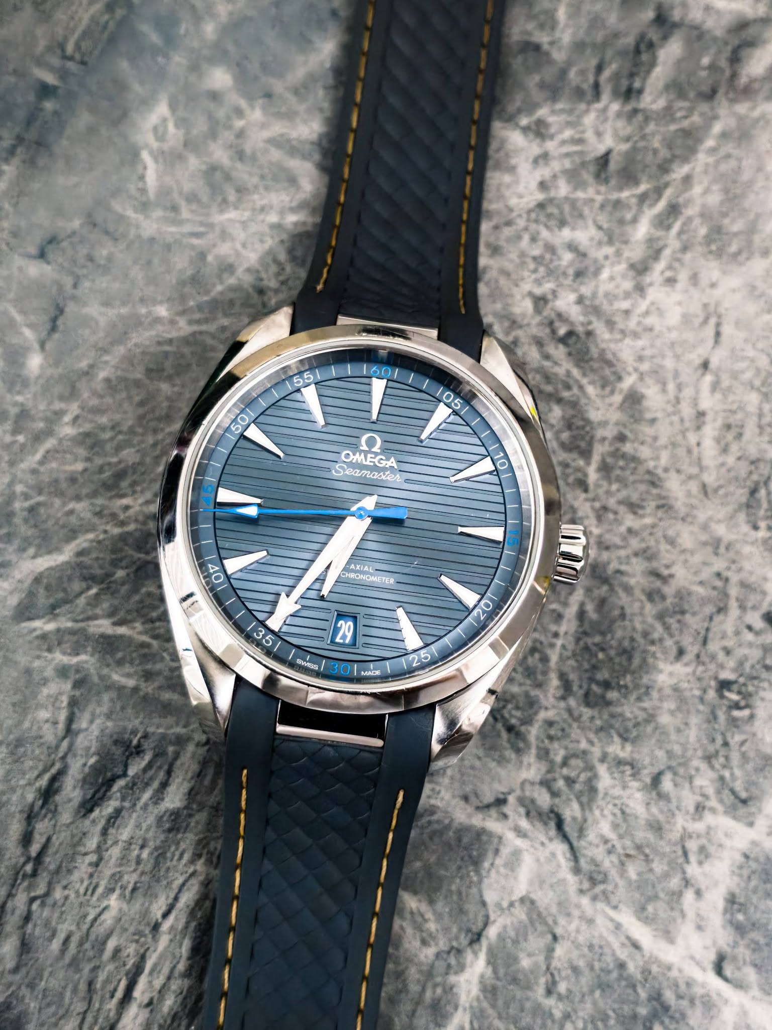 May be an image of wrist watch and text