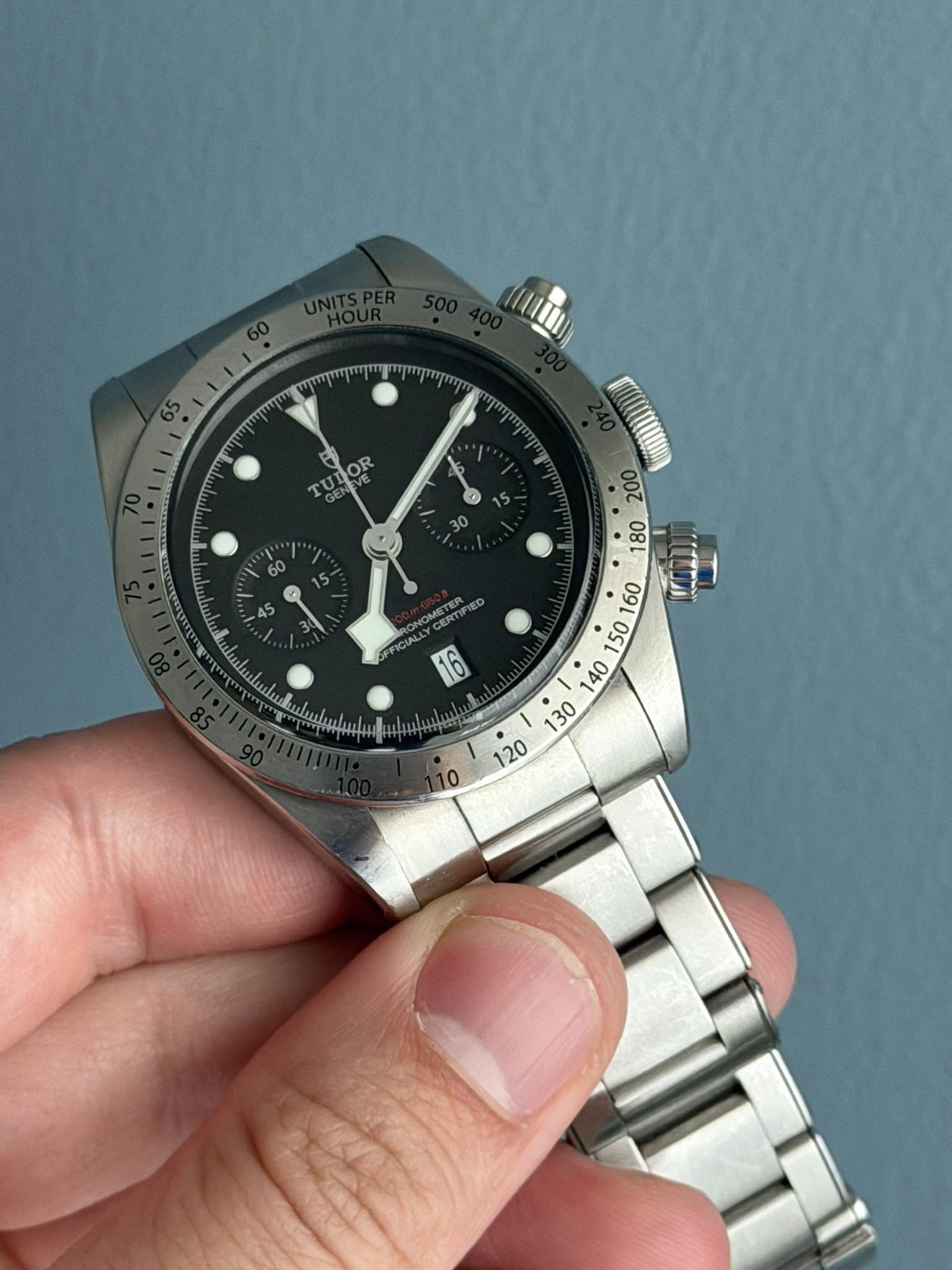 May be an image of wrist watch and text