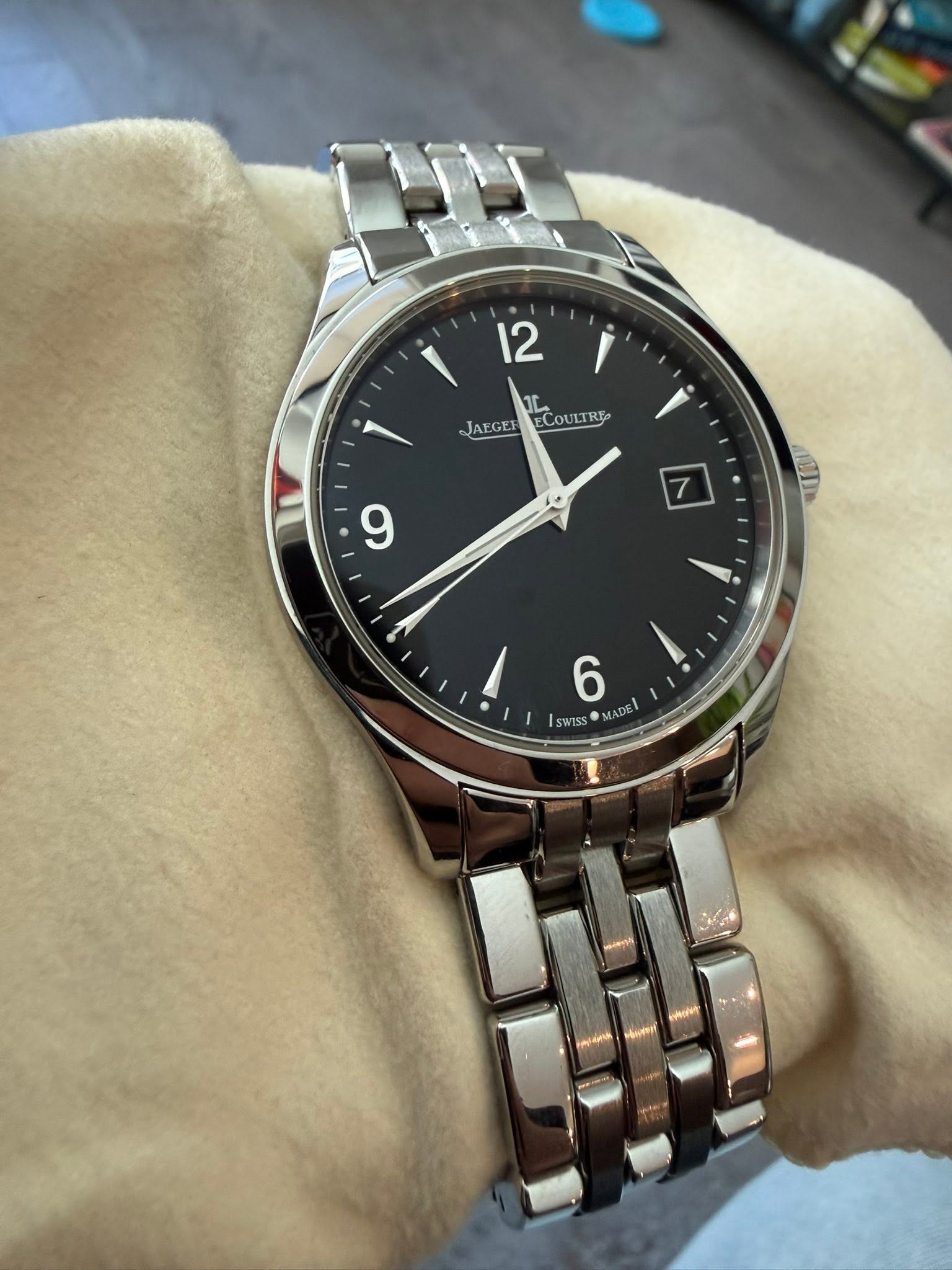 May be an image of wrist watch and text