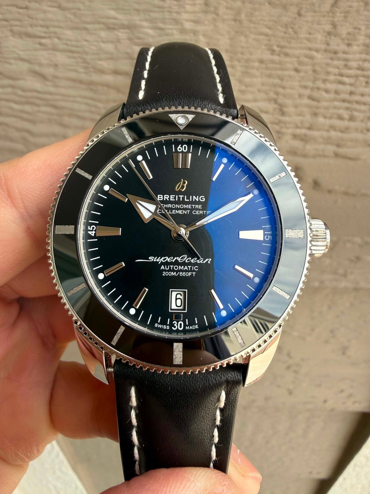 May be an image of wrist watch and text that says '60 주5세 เรมครรม B BREITLING THRONOMETI THRONOMETRE CALLEMENCERTIE CALLEMENT CERT 45 I 15 30000 superOcean AUTOMATIC IC 200M/…
