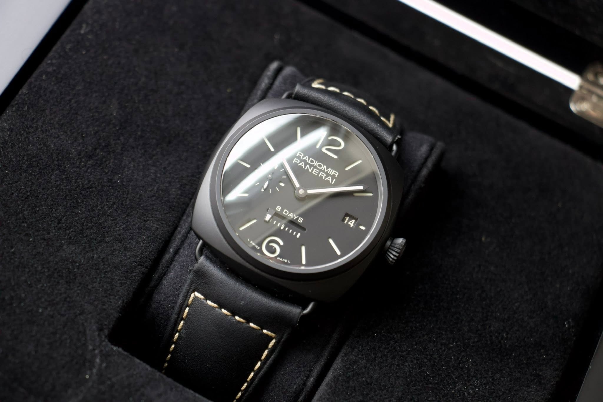 May be an image of wrist watch, leather and text that says 'PANERAI PANEIR HADIOMID RADIOMIR 2 8 DAYS S S 二1 ي 6 RAMEL HAWEL ه'