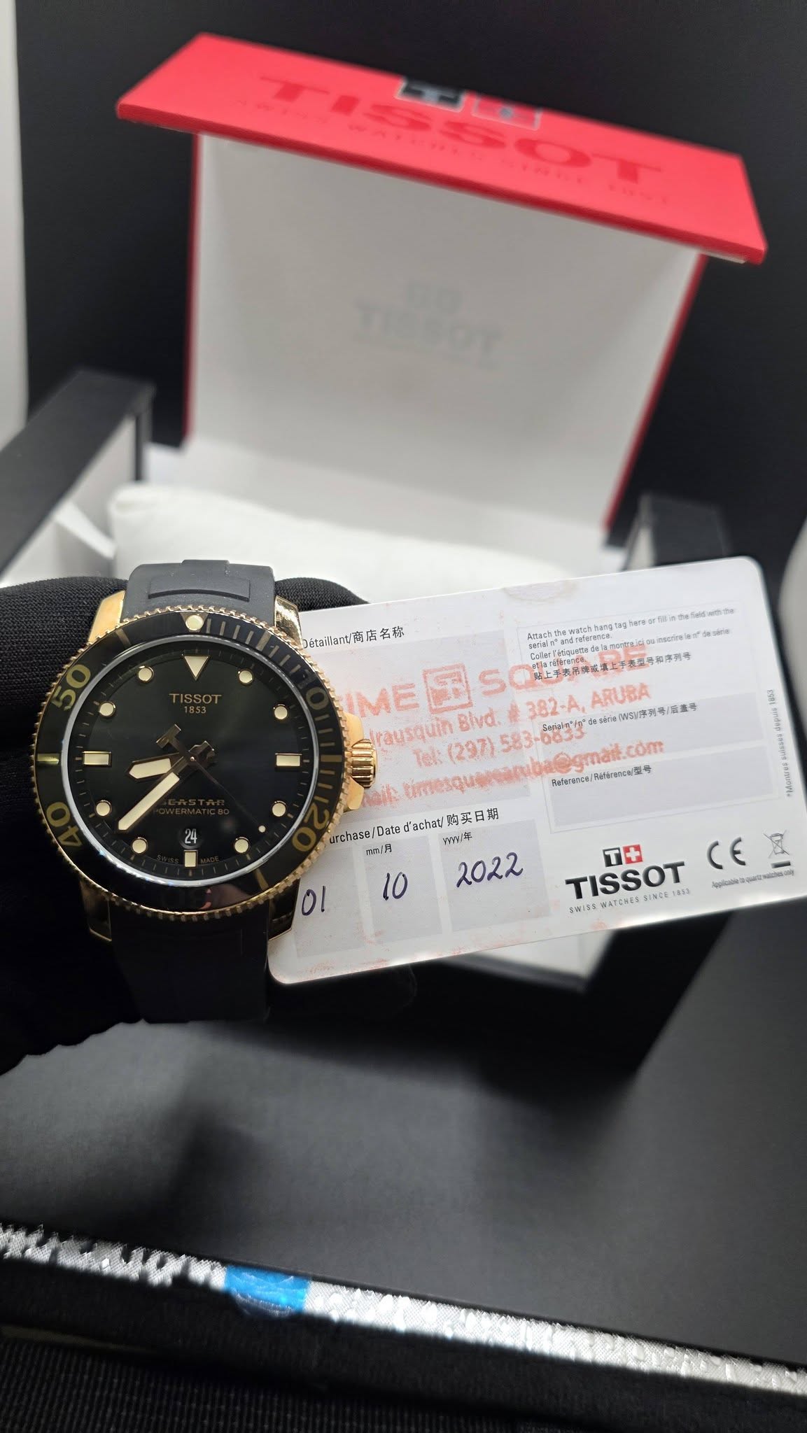 May be an image of wrist watch and text