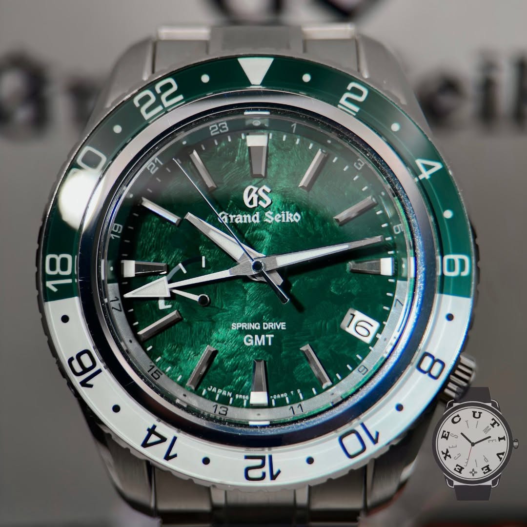 May be an image of wrist watch and text that says ' GS GrandSeiko Grand Seiko 18 6 6 SPRING DRIVE GMT 16 6 9 8 三口 U 购 ن 2 ラ 12 Οι'