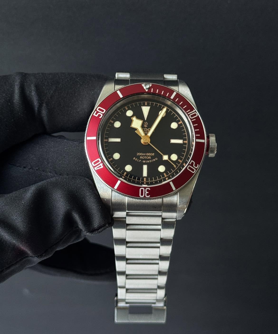May be an image of wrist watch and text