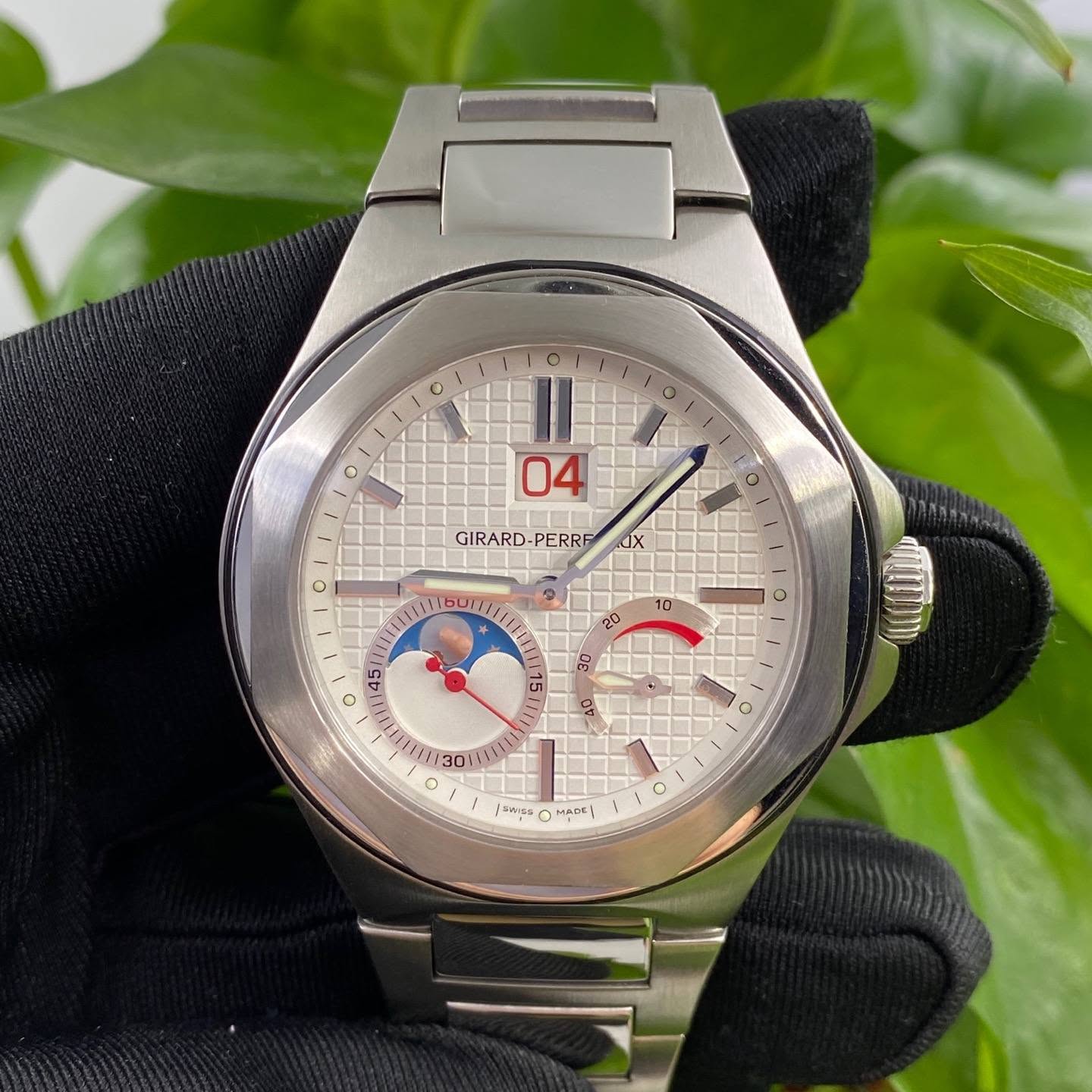 May be an image of wrist watch and text